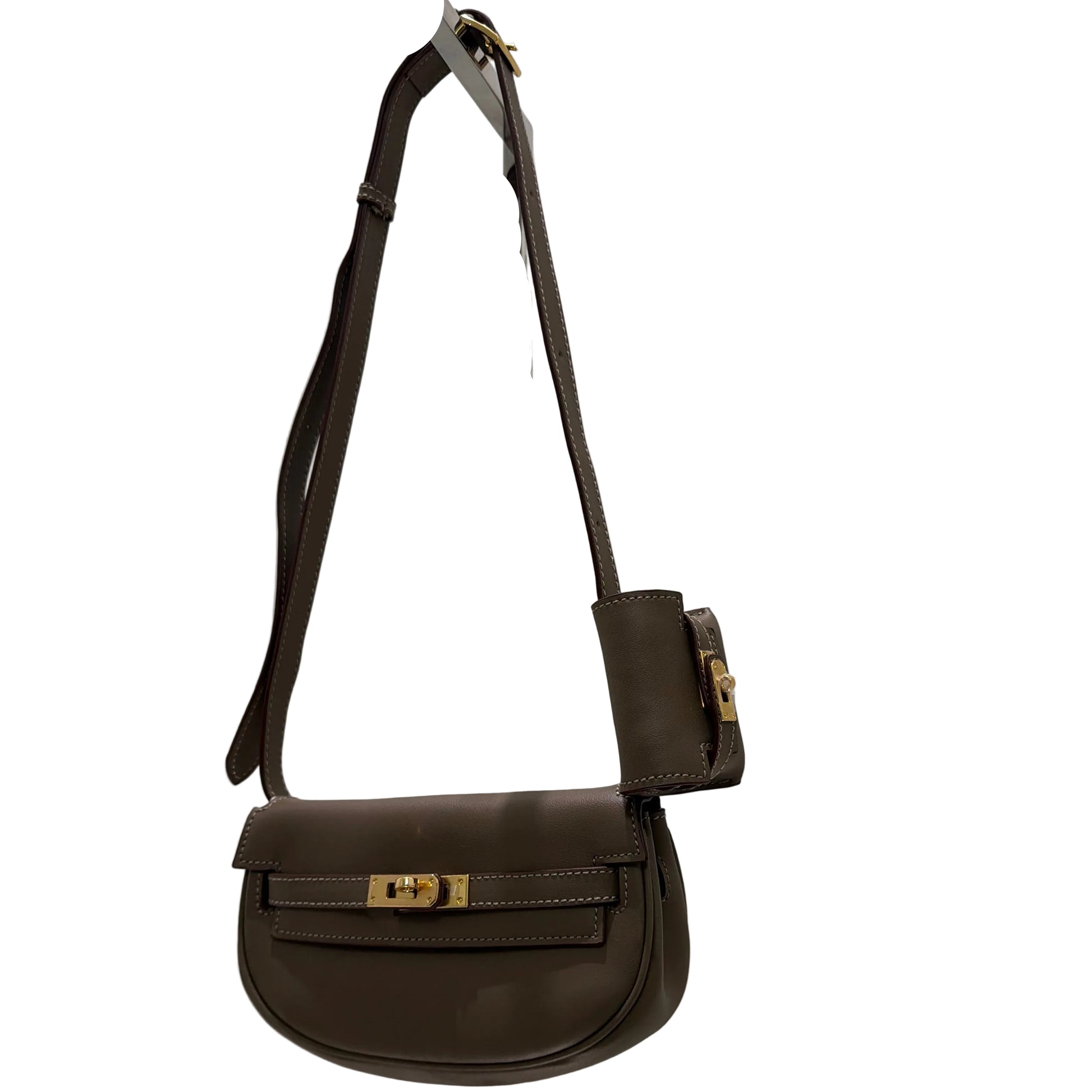 Brown leather bag with gold hardware on a white background