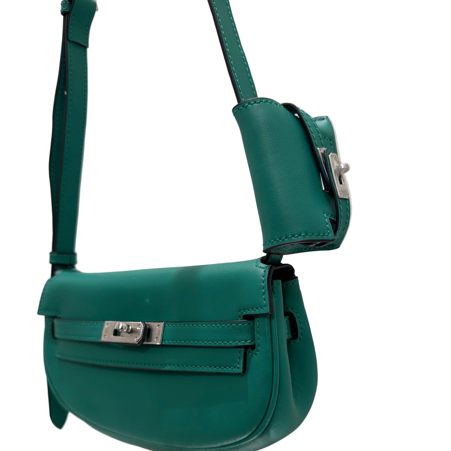 Green leather waist bag on a white background