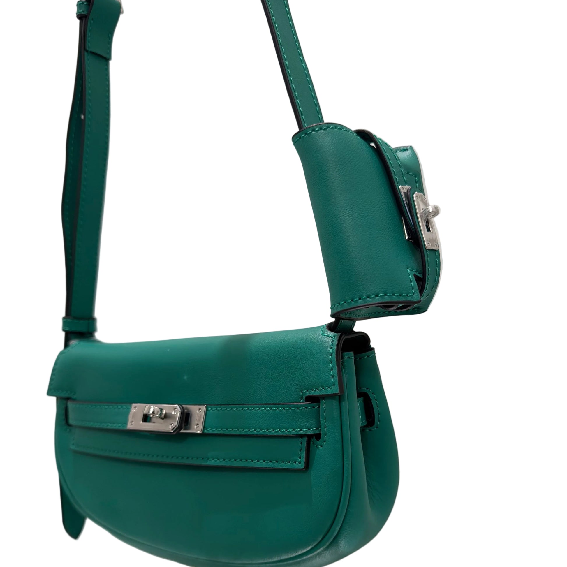 Green leather waist bag on a white background