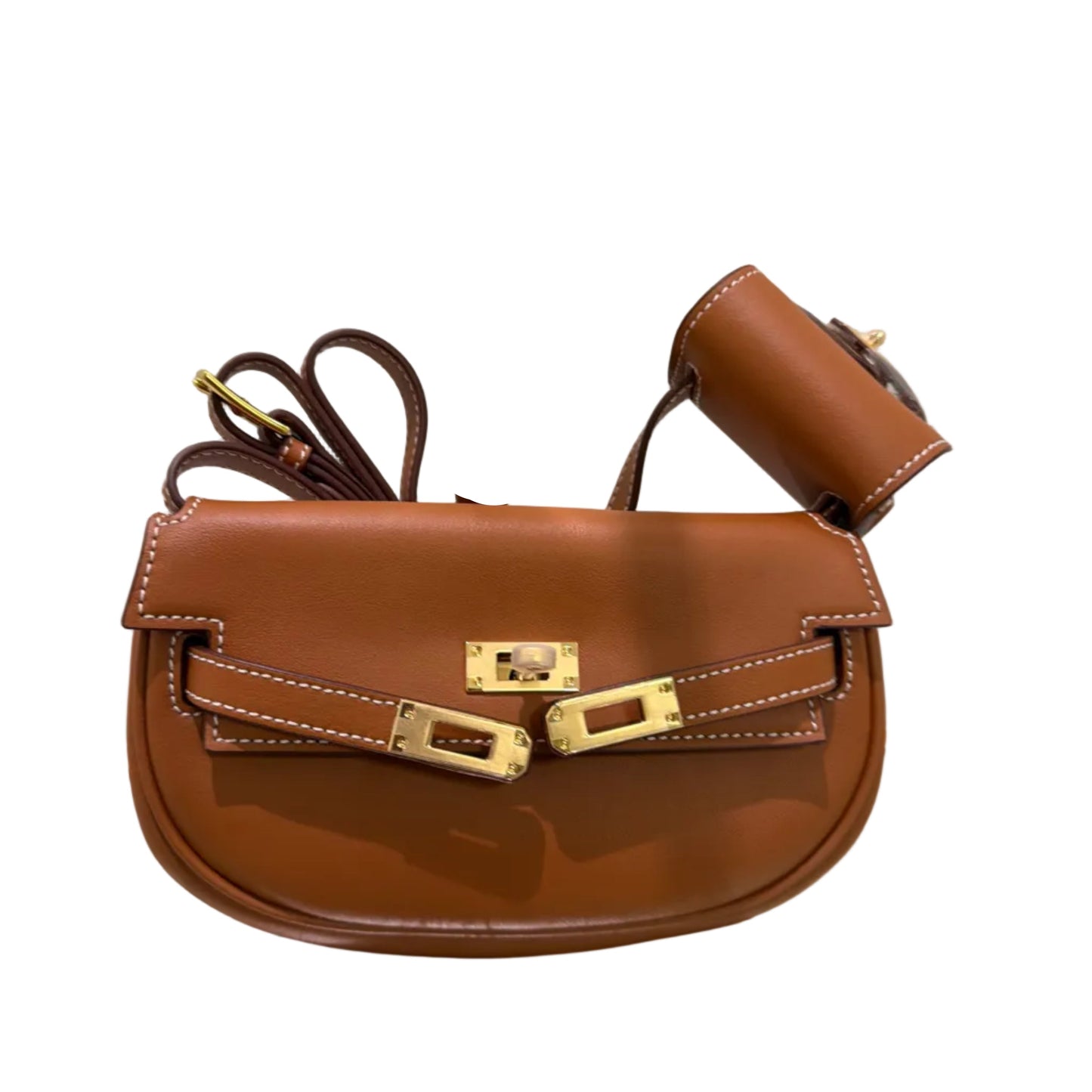Brown leather handbag with gold accents on a white surface