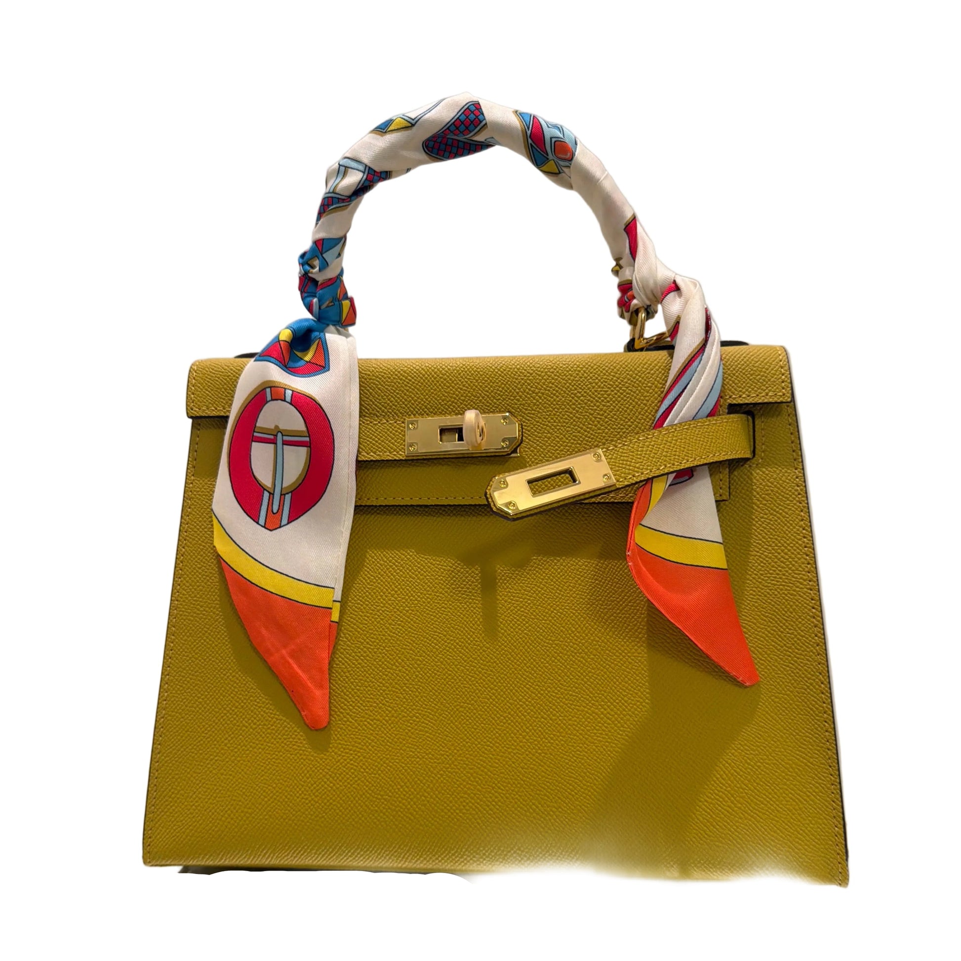Yellow handbag with colorful handle and decorative elements on a white background
