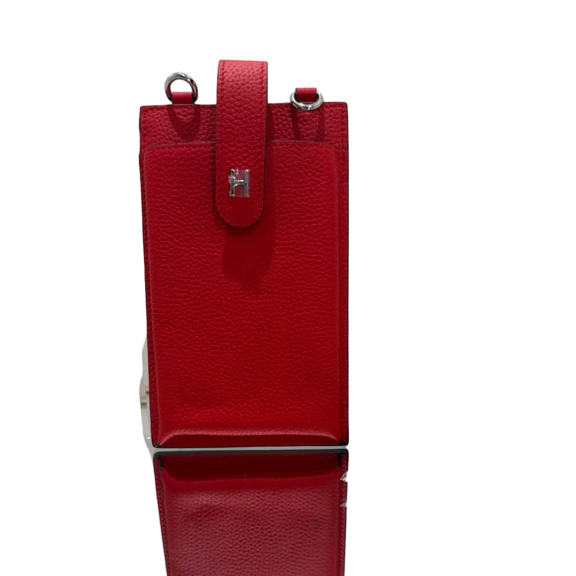 Red leather handbag on a white background