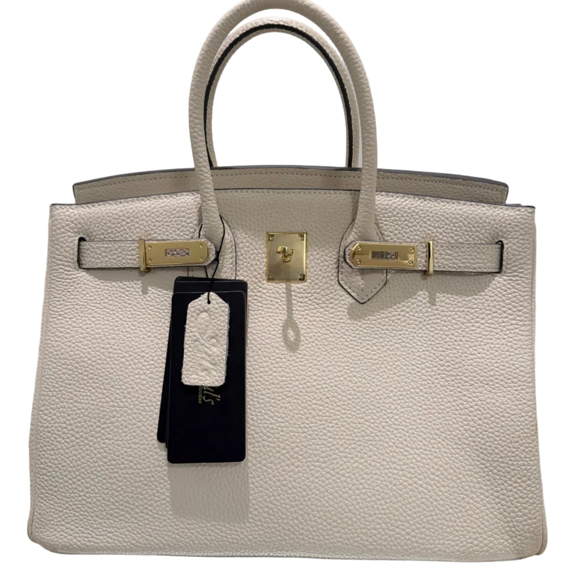 Beige handbag with gold hardware on a light gray background