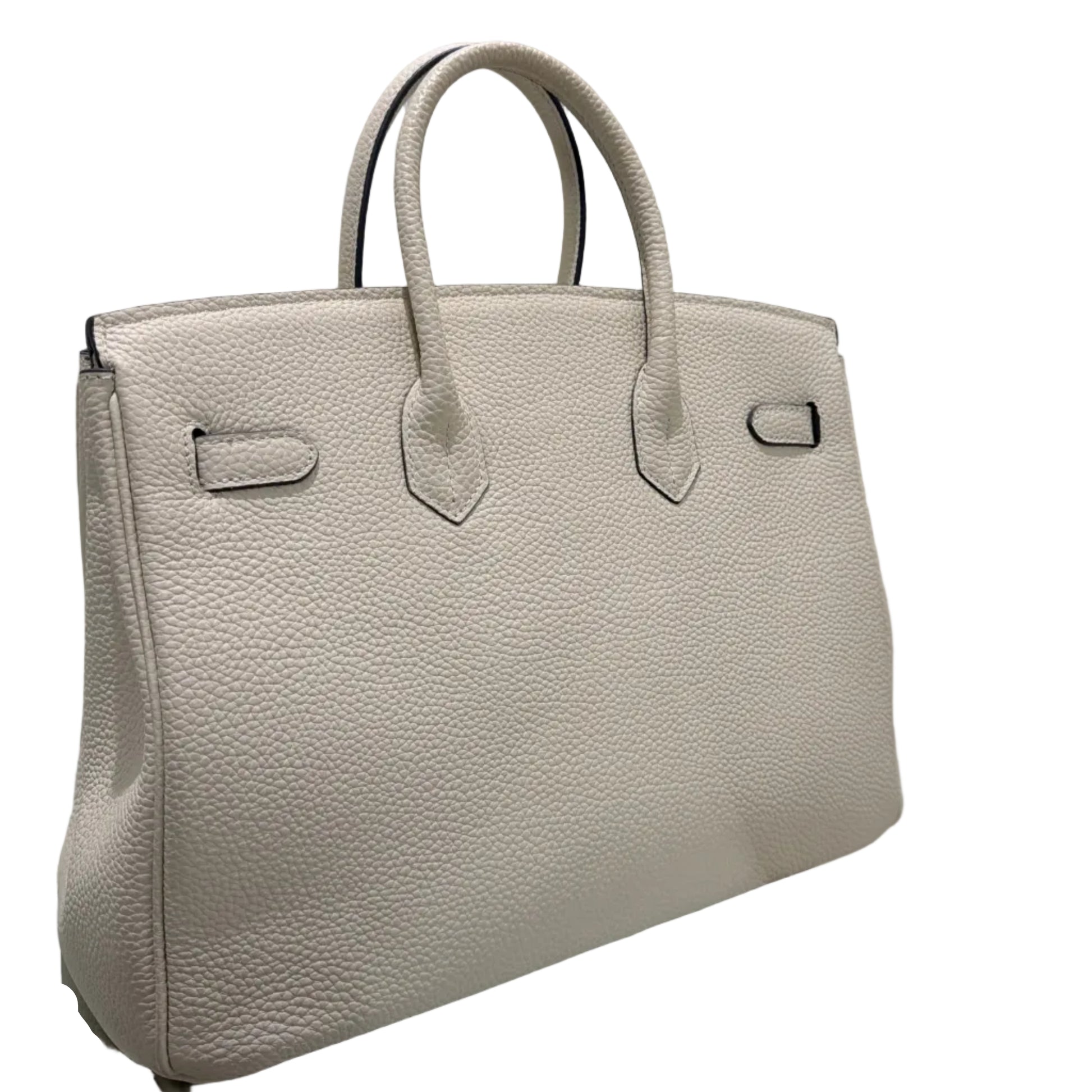 Beige handbag on a white background