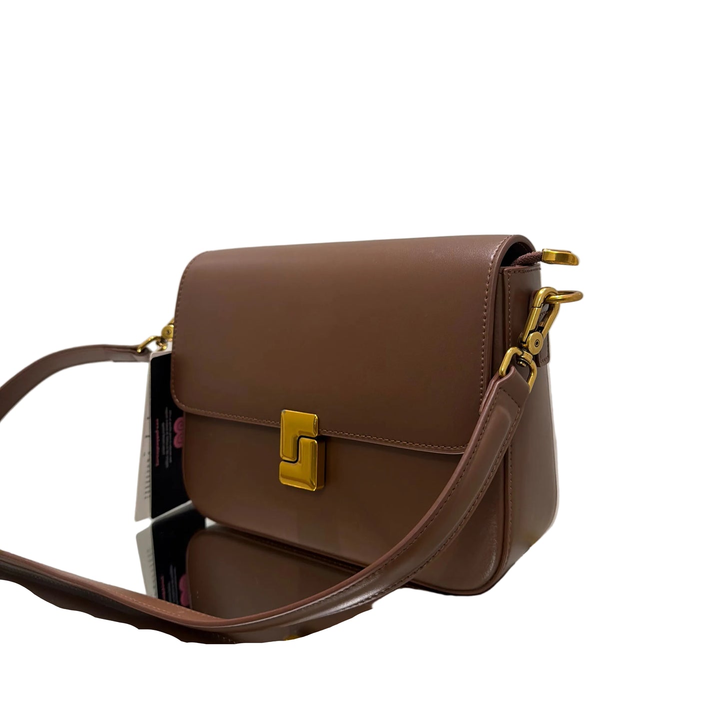 Brown handbag with gold accents on a white background
