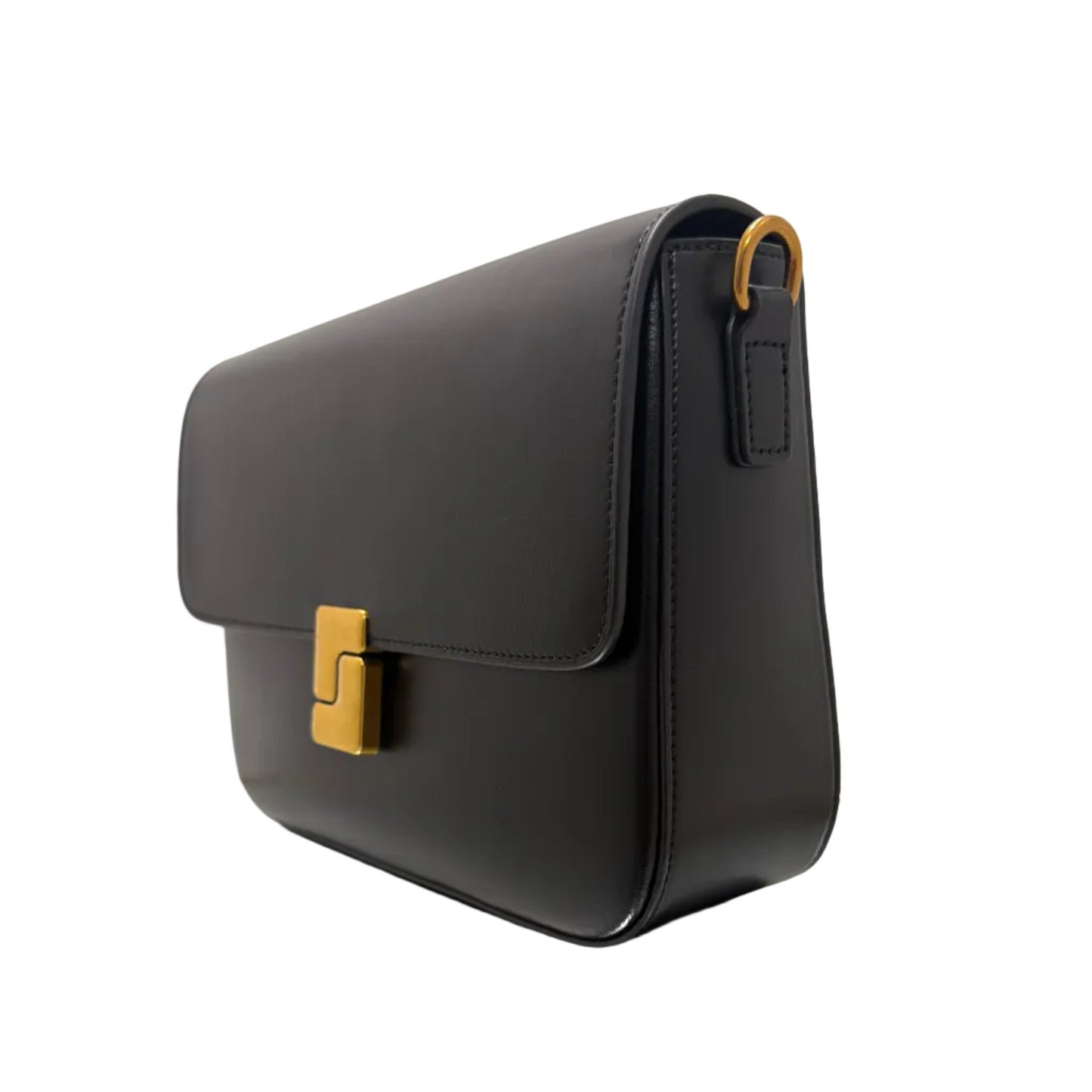 Black handbag with gold hardware on a white surface
