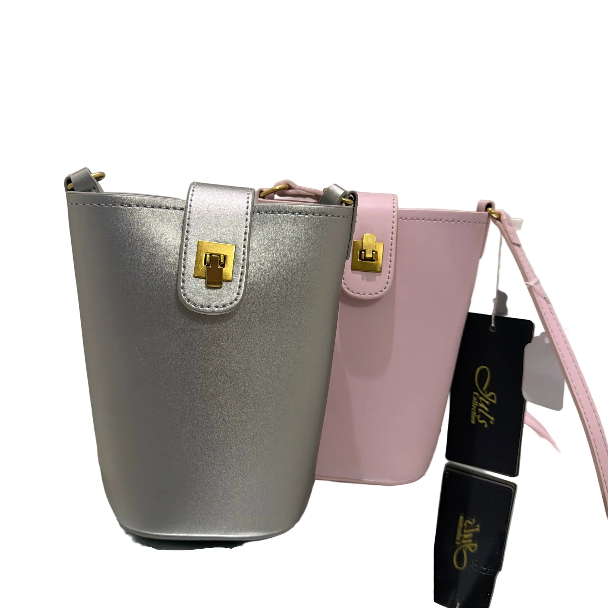 Two handbags, one silver and one pink, with gold accents, on a gray background.