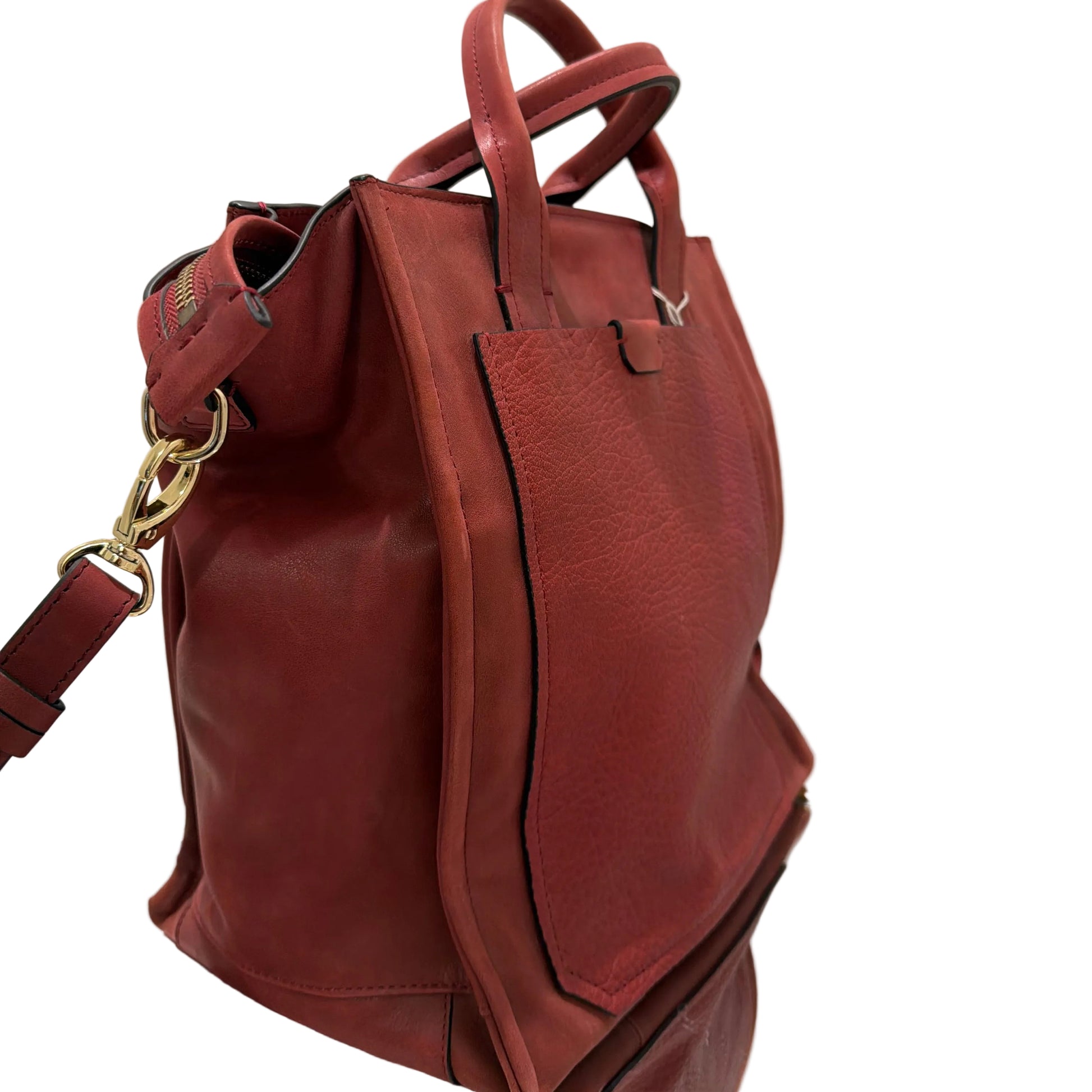 Brown leather backpack on a white background