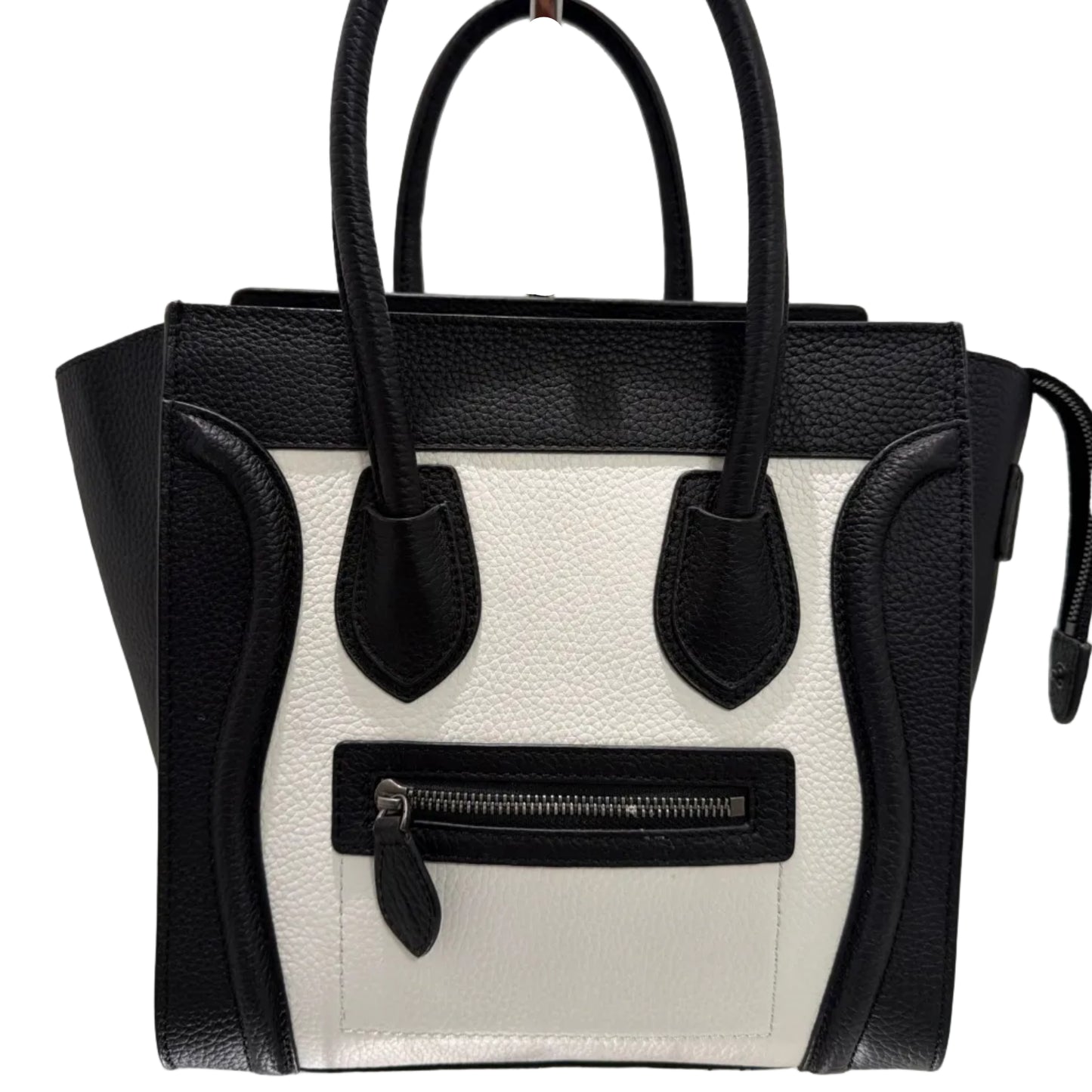 Black and white handbag with a visible brand logo on a light background