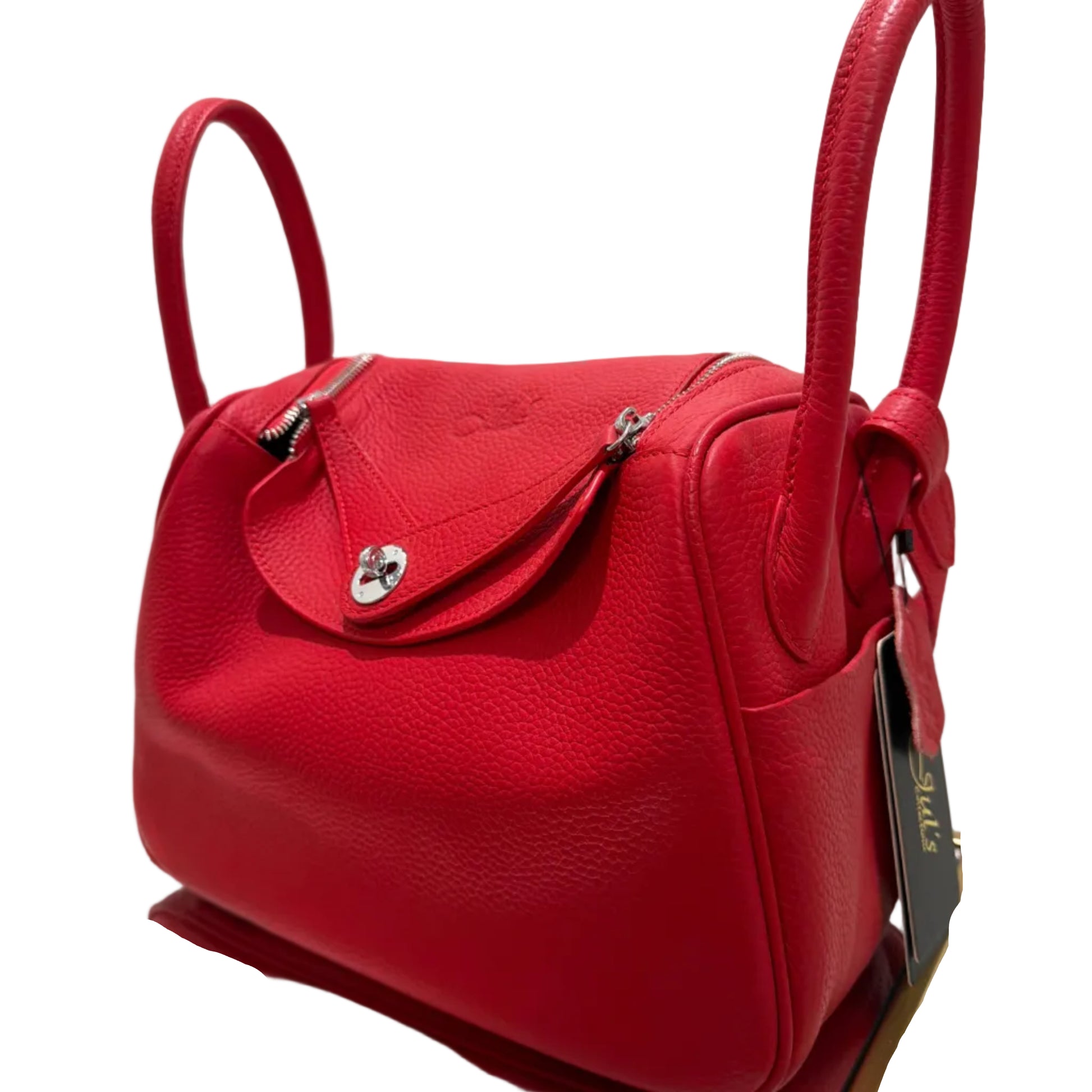Red handbag on a white background