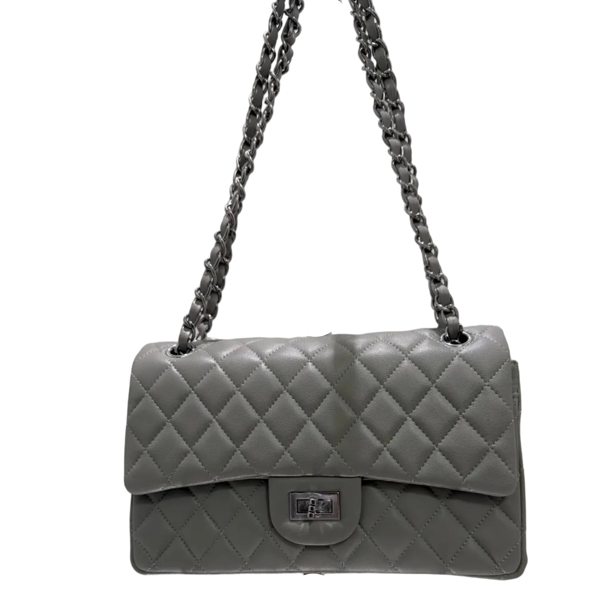 Gray quilted handbag with chain strap on a white surface