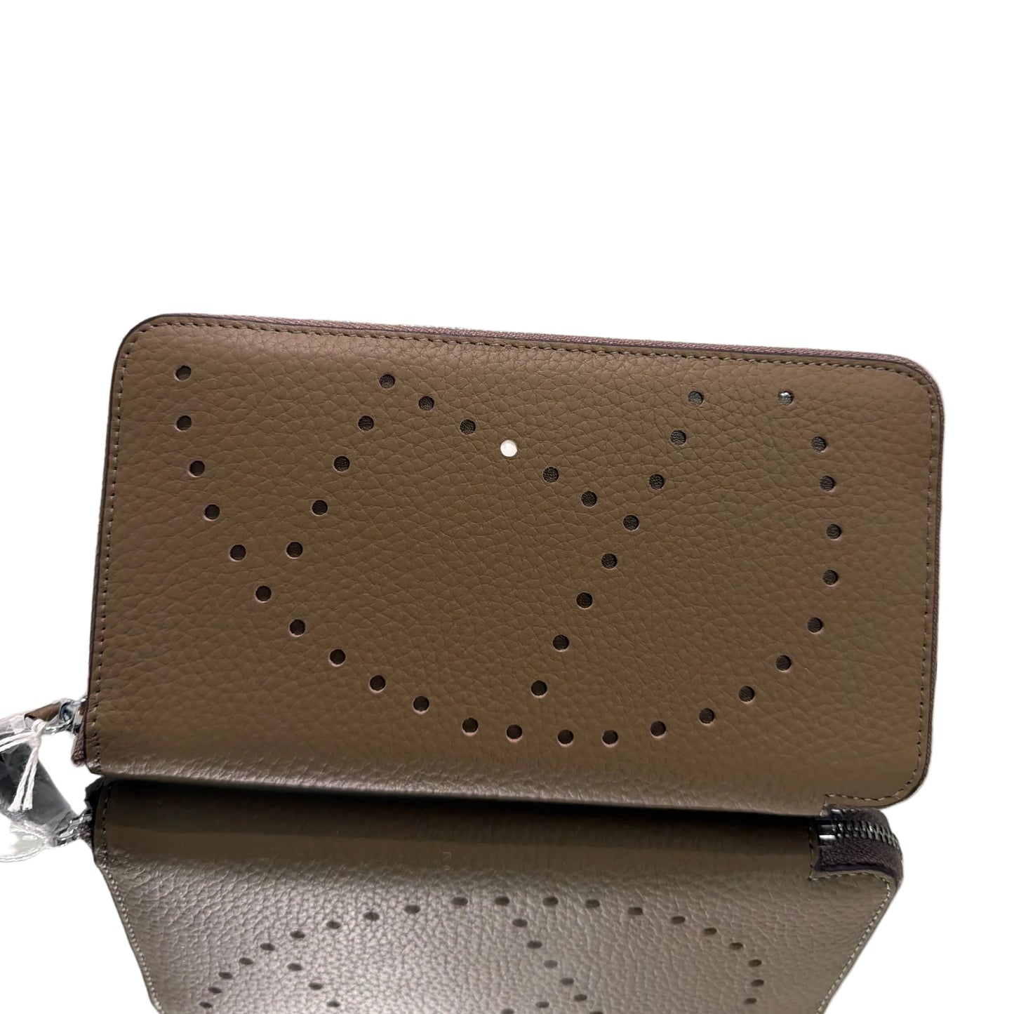 Brown leather phone case with perforated design on a white background