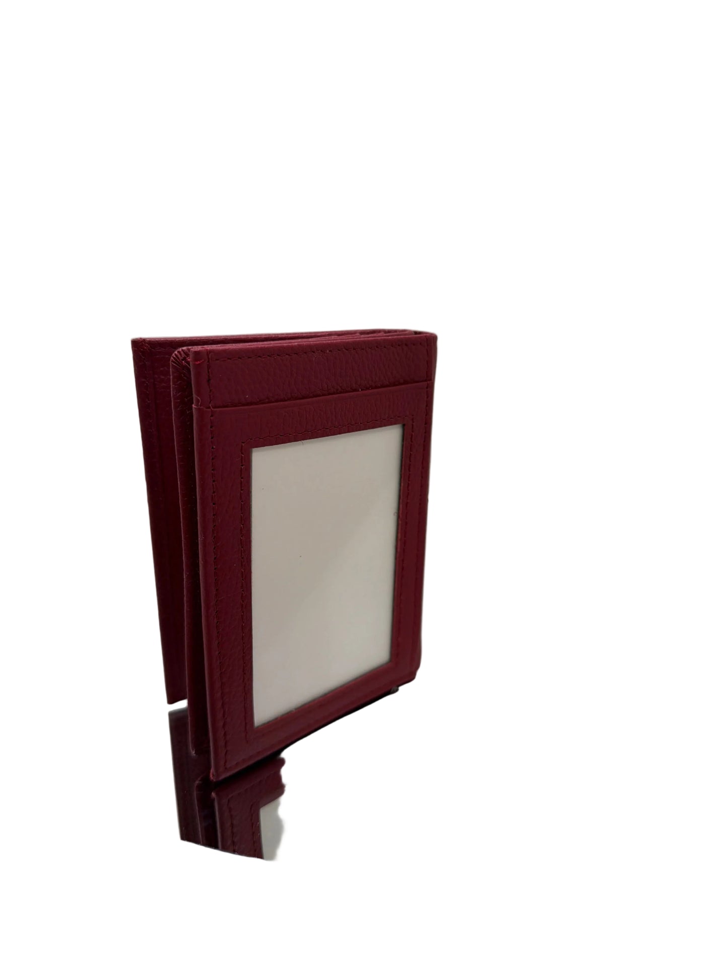 Foldable red mirror with gold frame on a white background