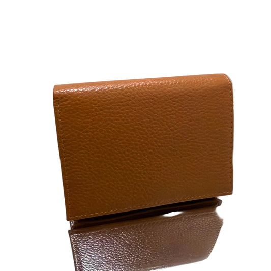 Brown leather wallet on a white surface