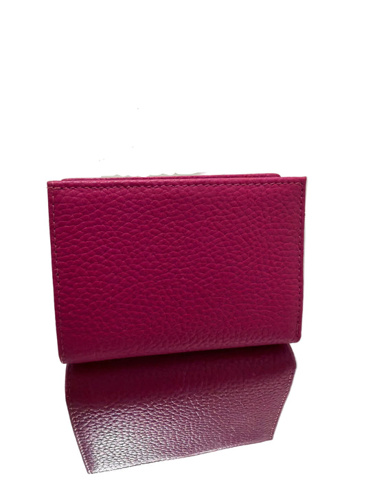 Two purple leather wallets on a white surface