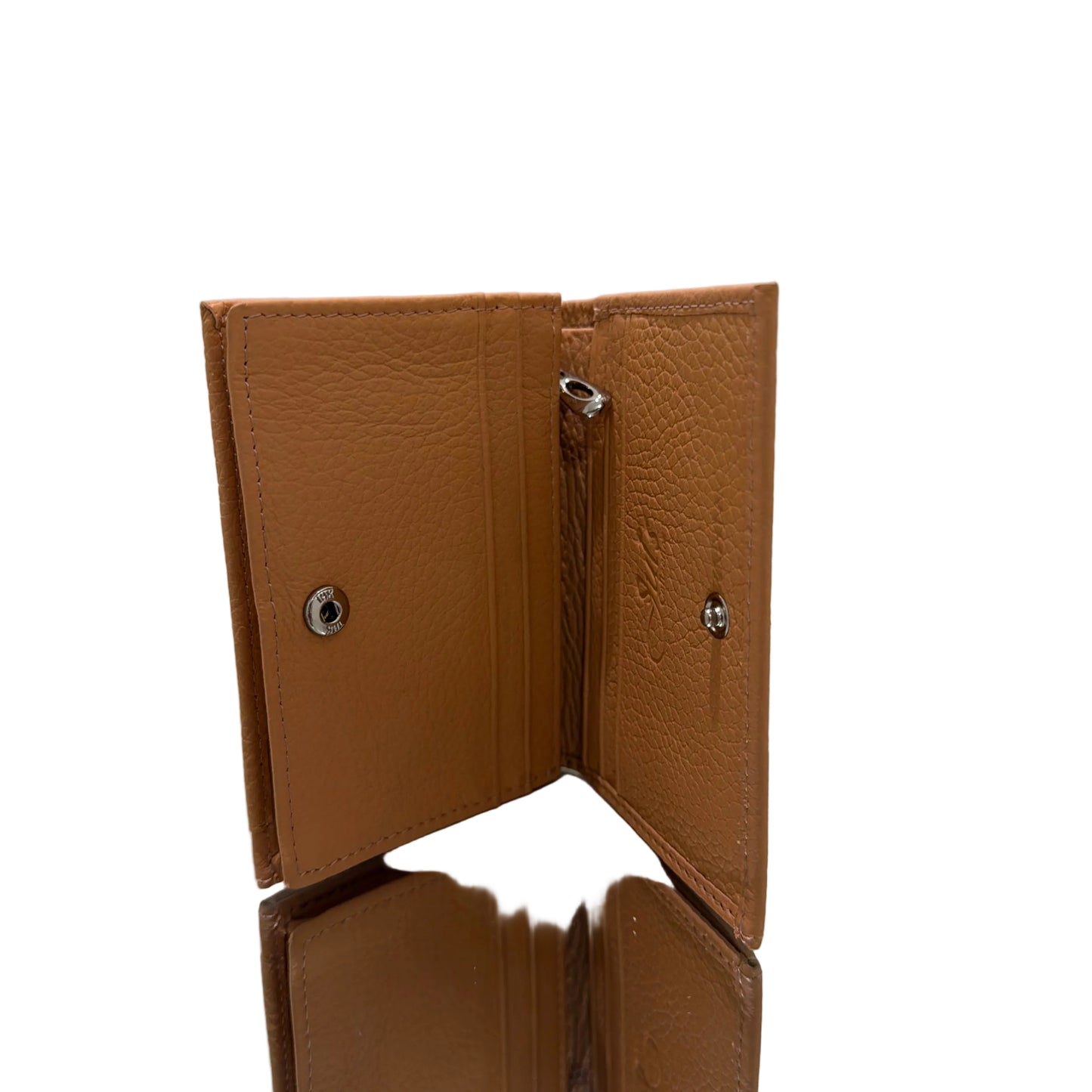 Brown leather wallet on a white surface