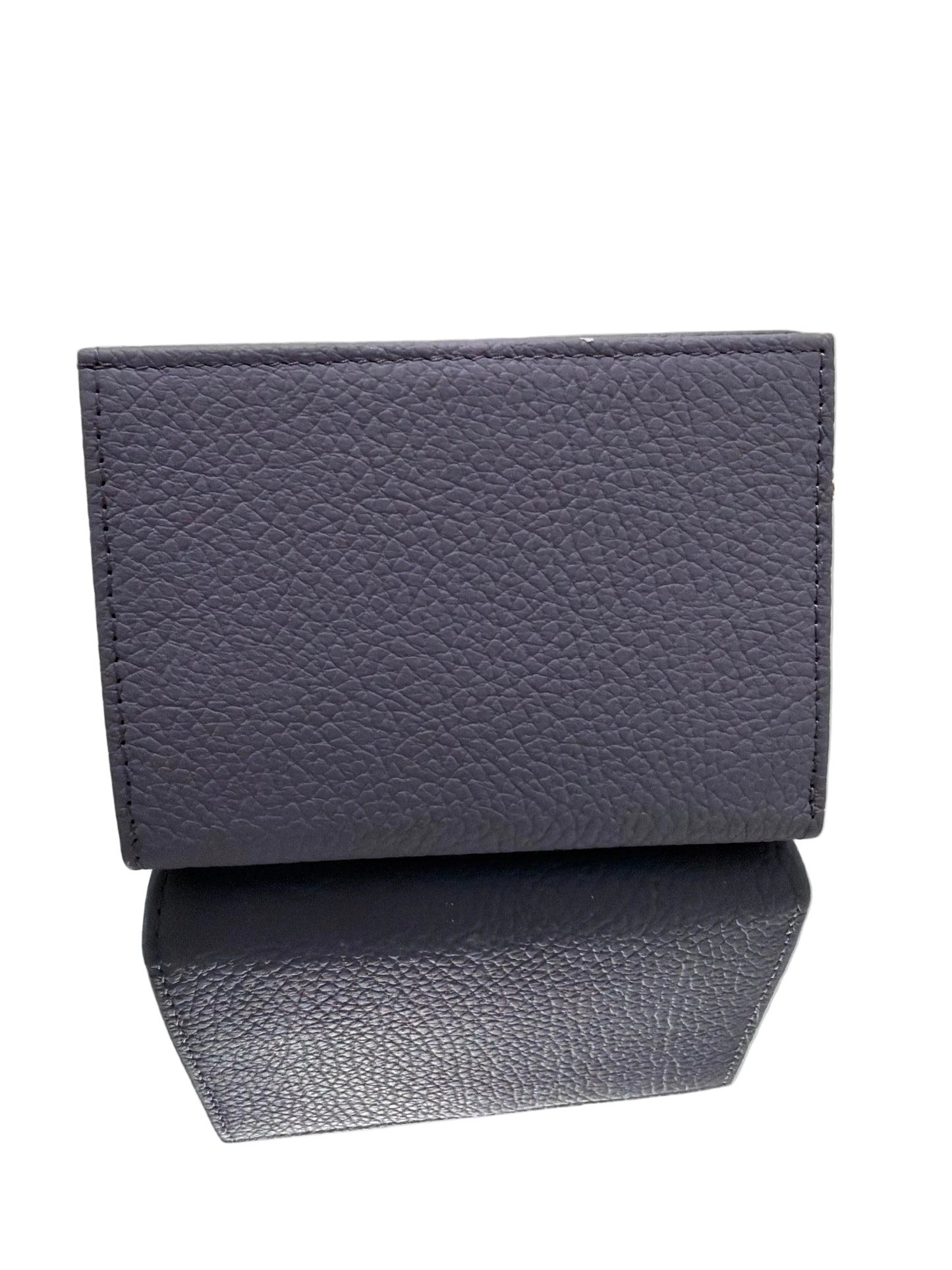 Two gray textured boxes on a white surface