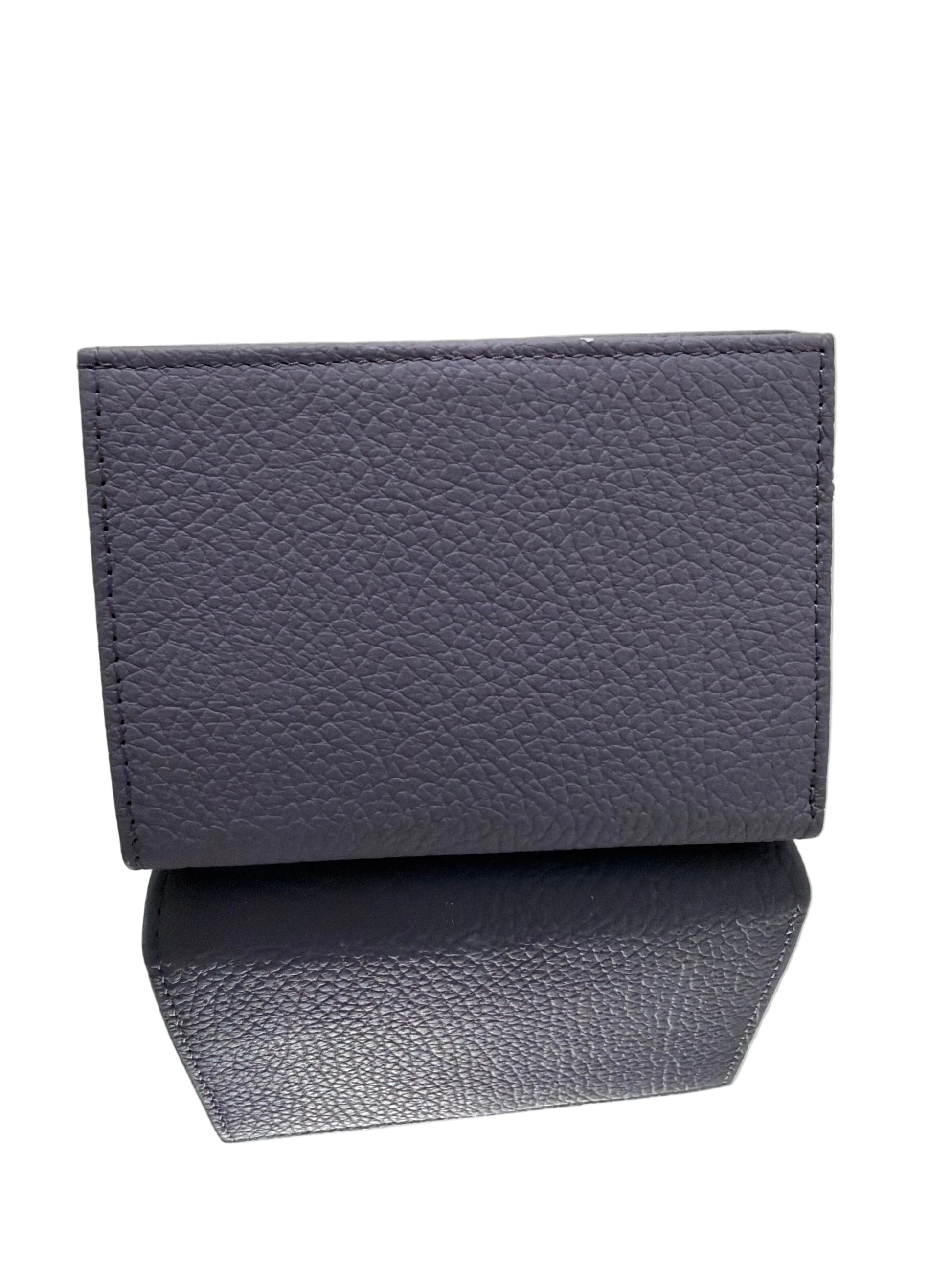 Two gray textured boxes on a white surface