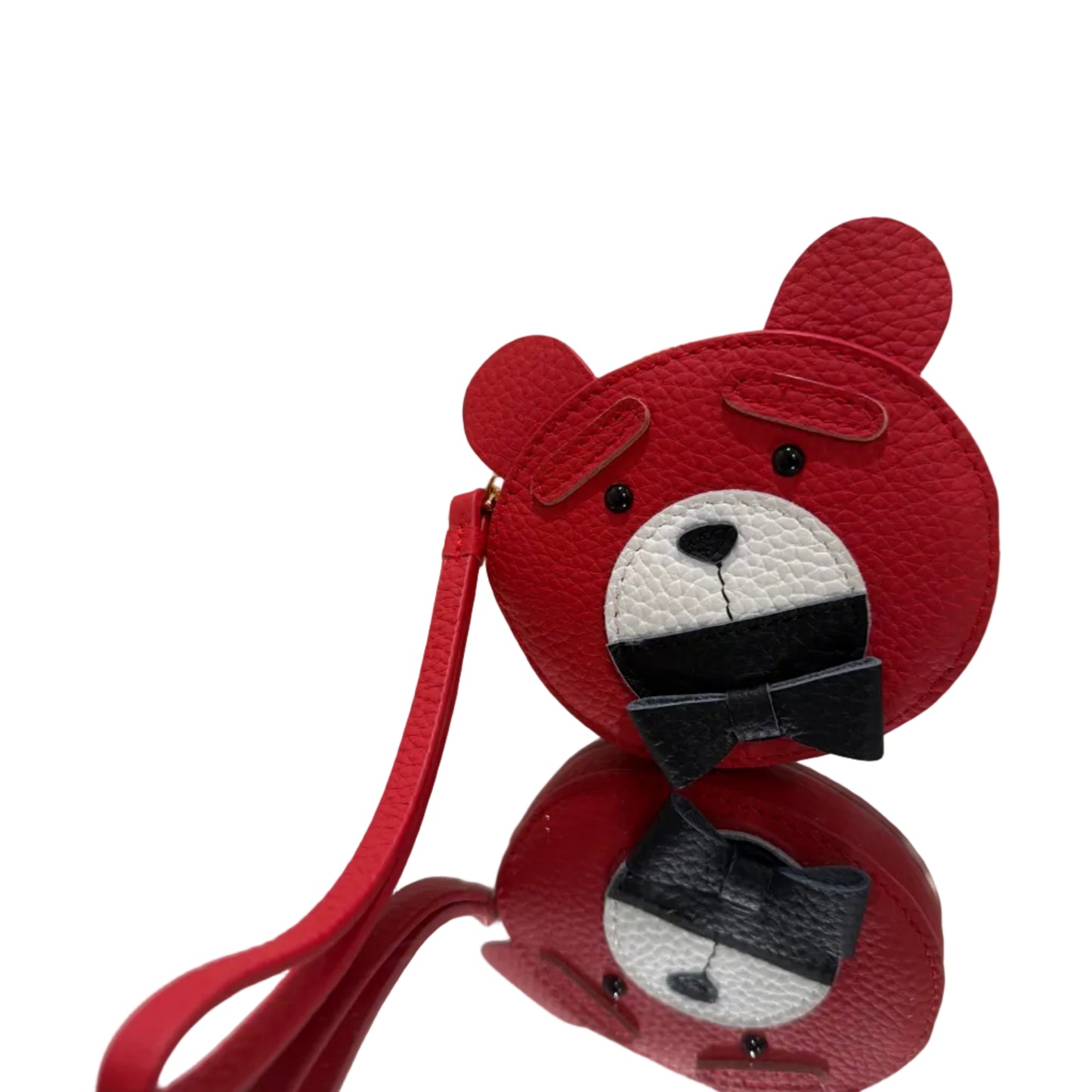 Red animal-shaped keychain with a strap on a white background