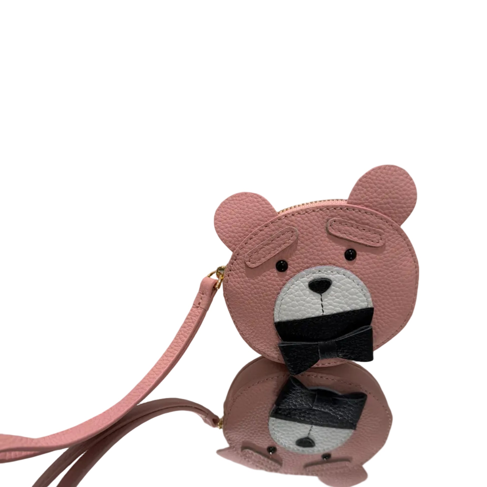 Pink animal-shaped phone case with a black bow on a white background