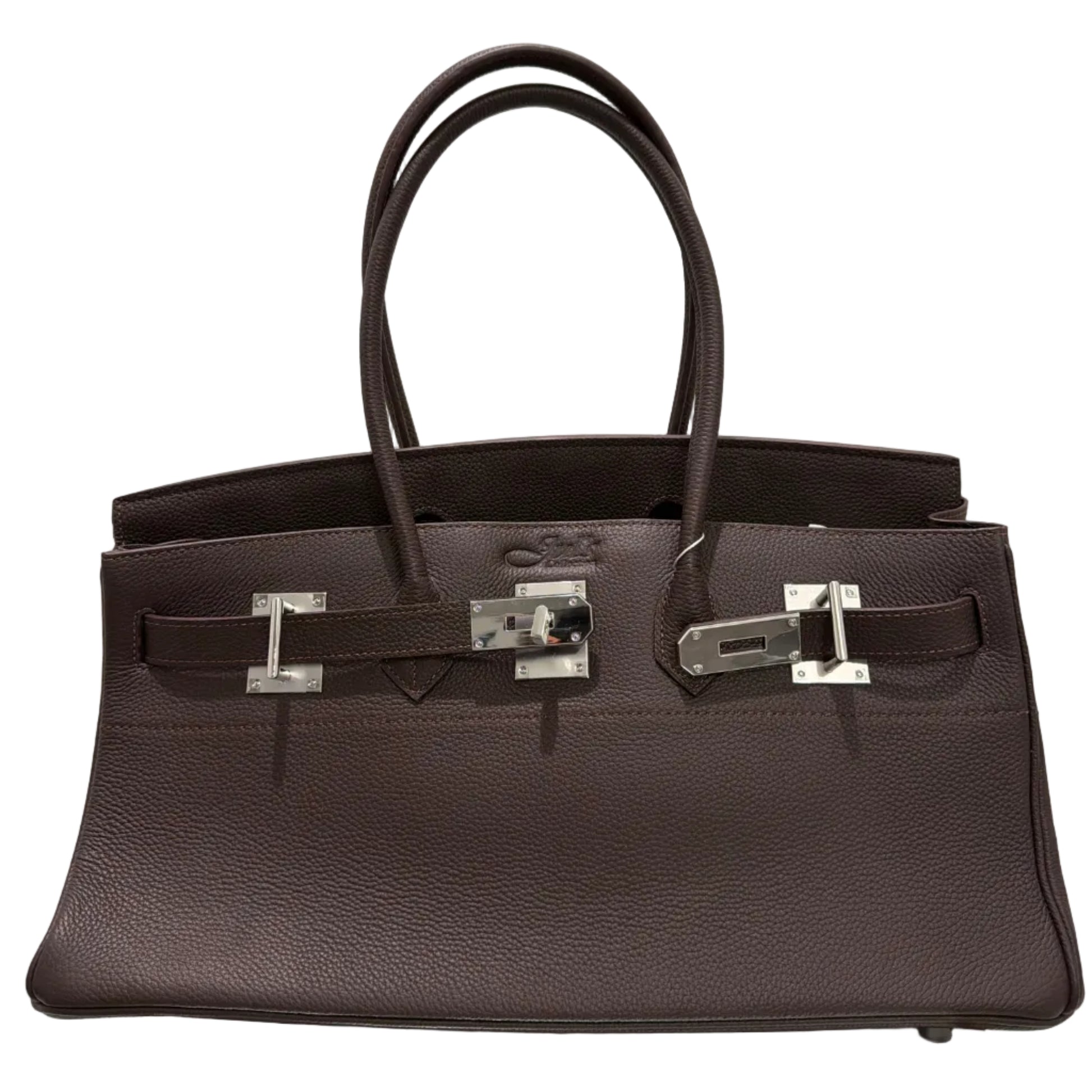 Dark brown leather handbag with silver hardware on a light beige background