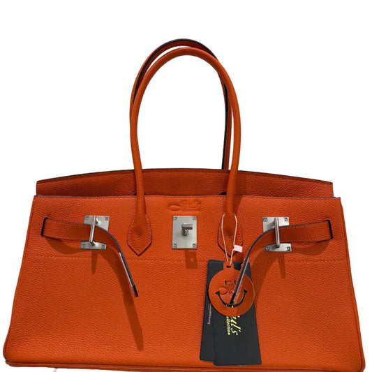 Orange handbag with silver hardware on a white background