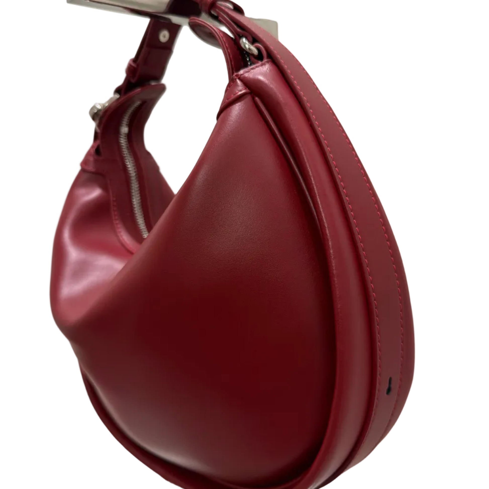 Maroon leather handbag on a white background