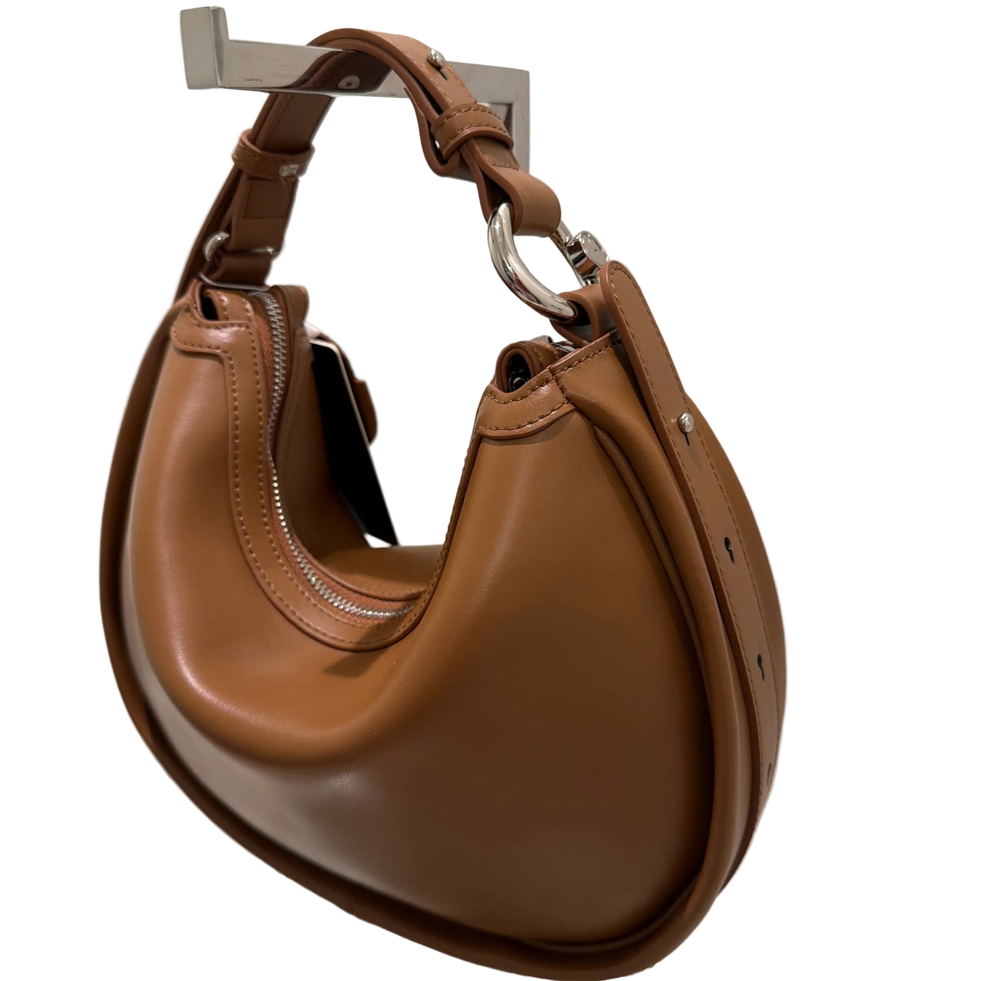 Brown leather saddle pad on a white background
