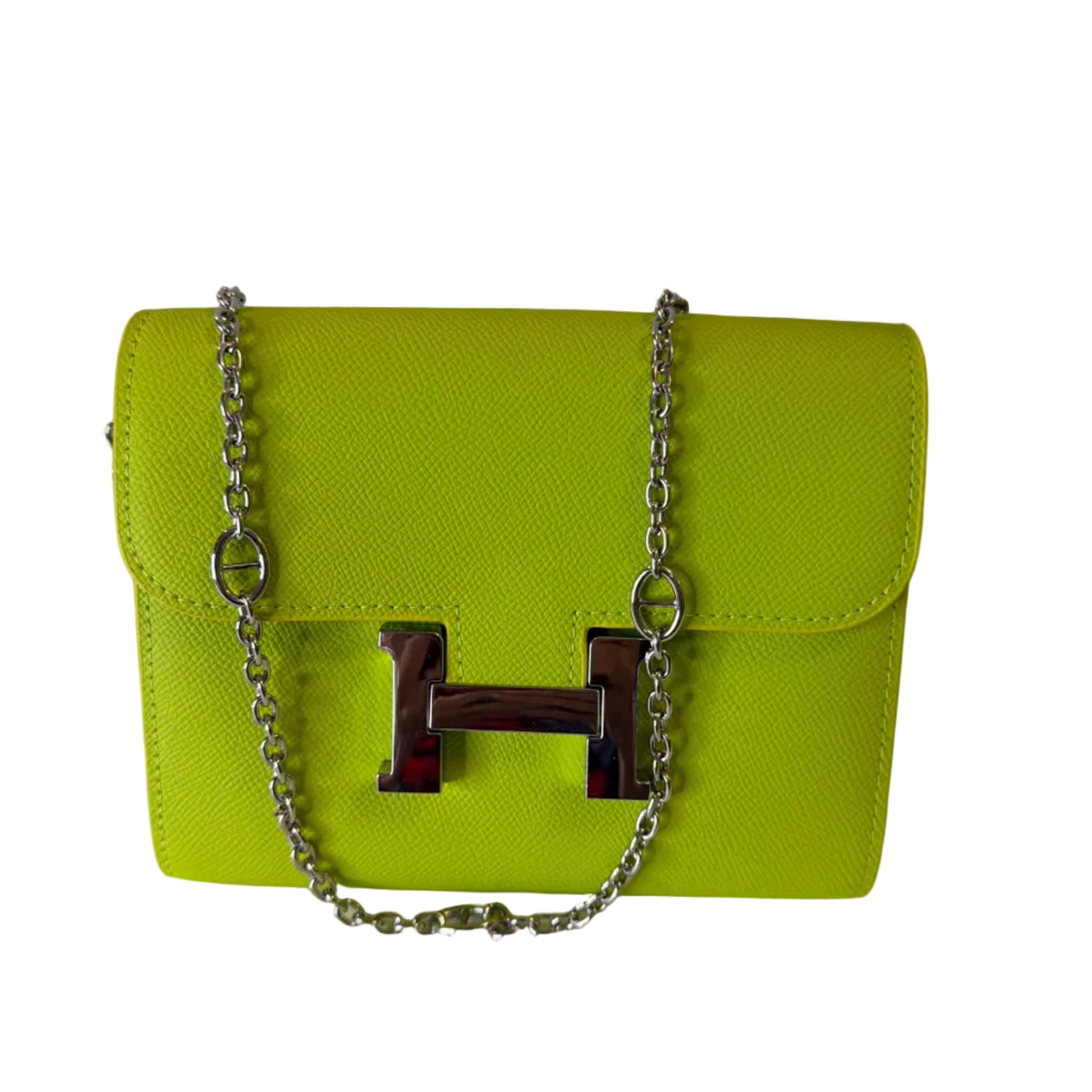 Green handbag with a chain detail on a white background