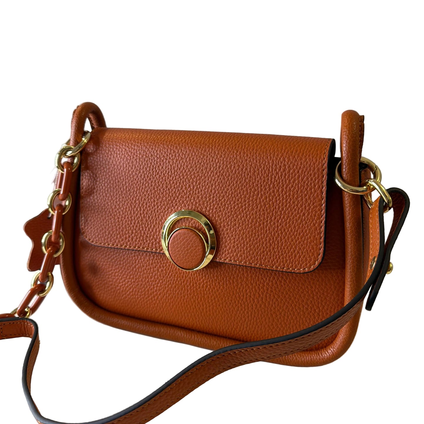 Brown leather handbag with gold clasp on a light gray background