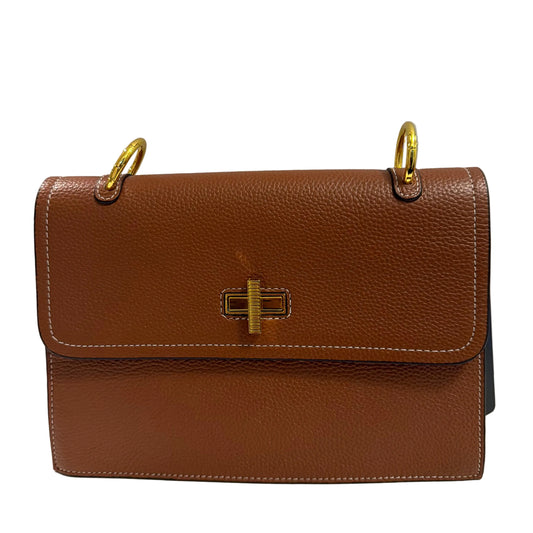 Brown leather wallet with gold accents on a light gray background