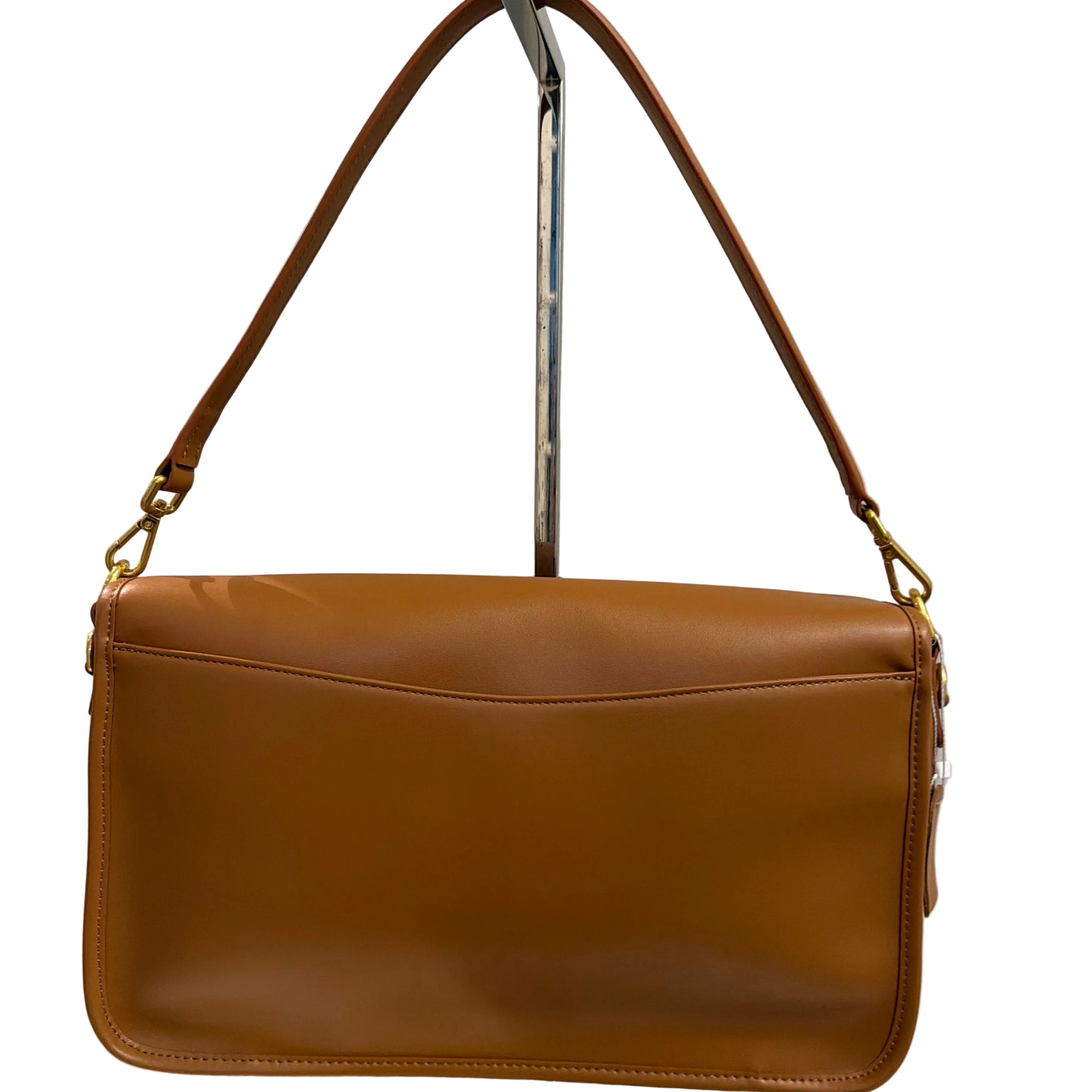 Brown leather clutch bag with a strap on a white background