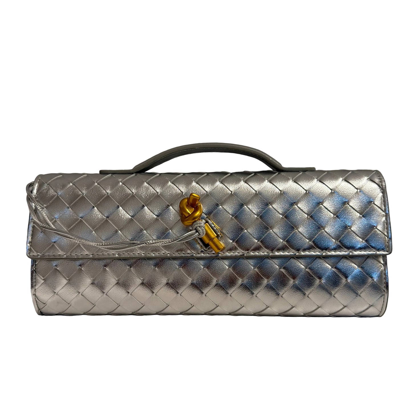 Woven clutch bag with gold clasp on a gray background
