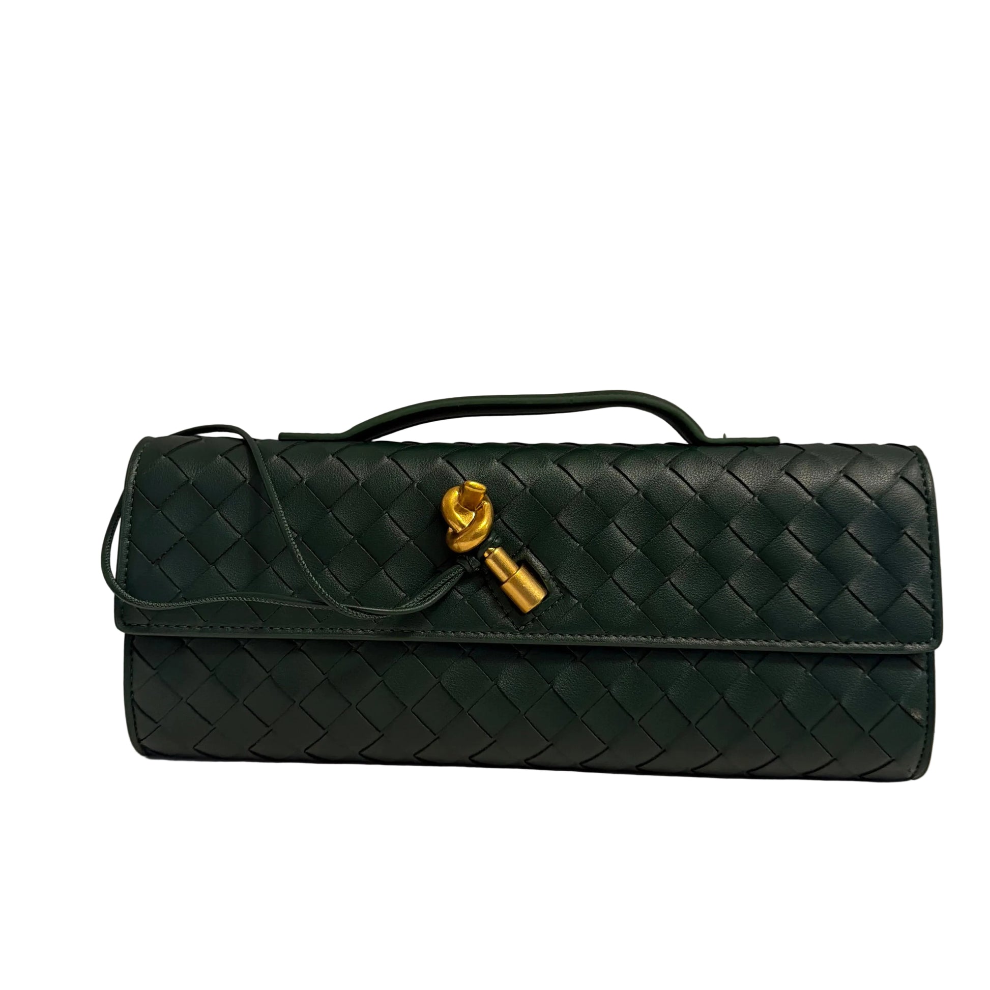 Green quilted handbag with a gold clasp on a light gray background
