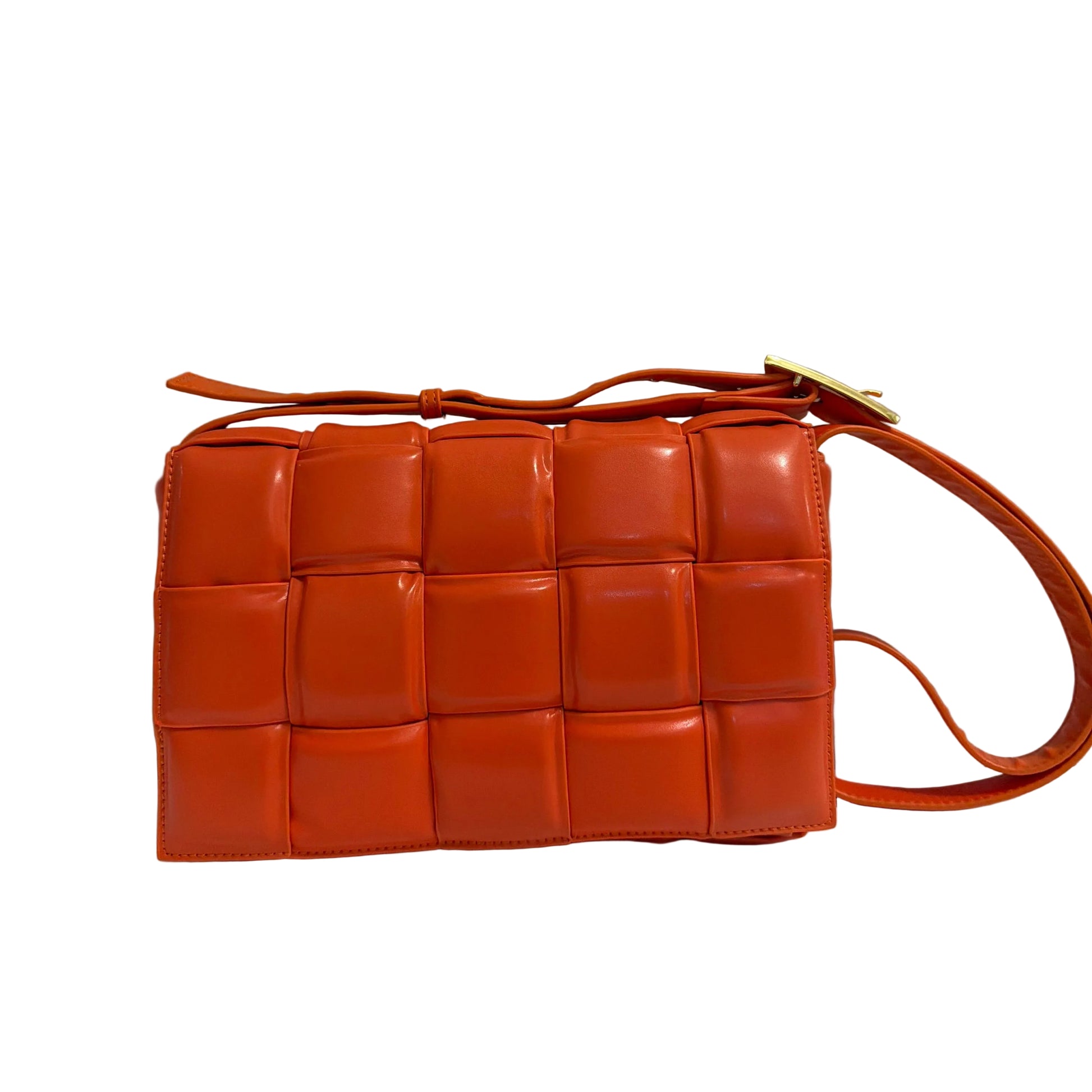Brown woven handbag on a light gray background