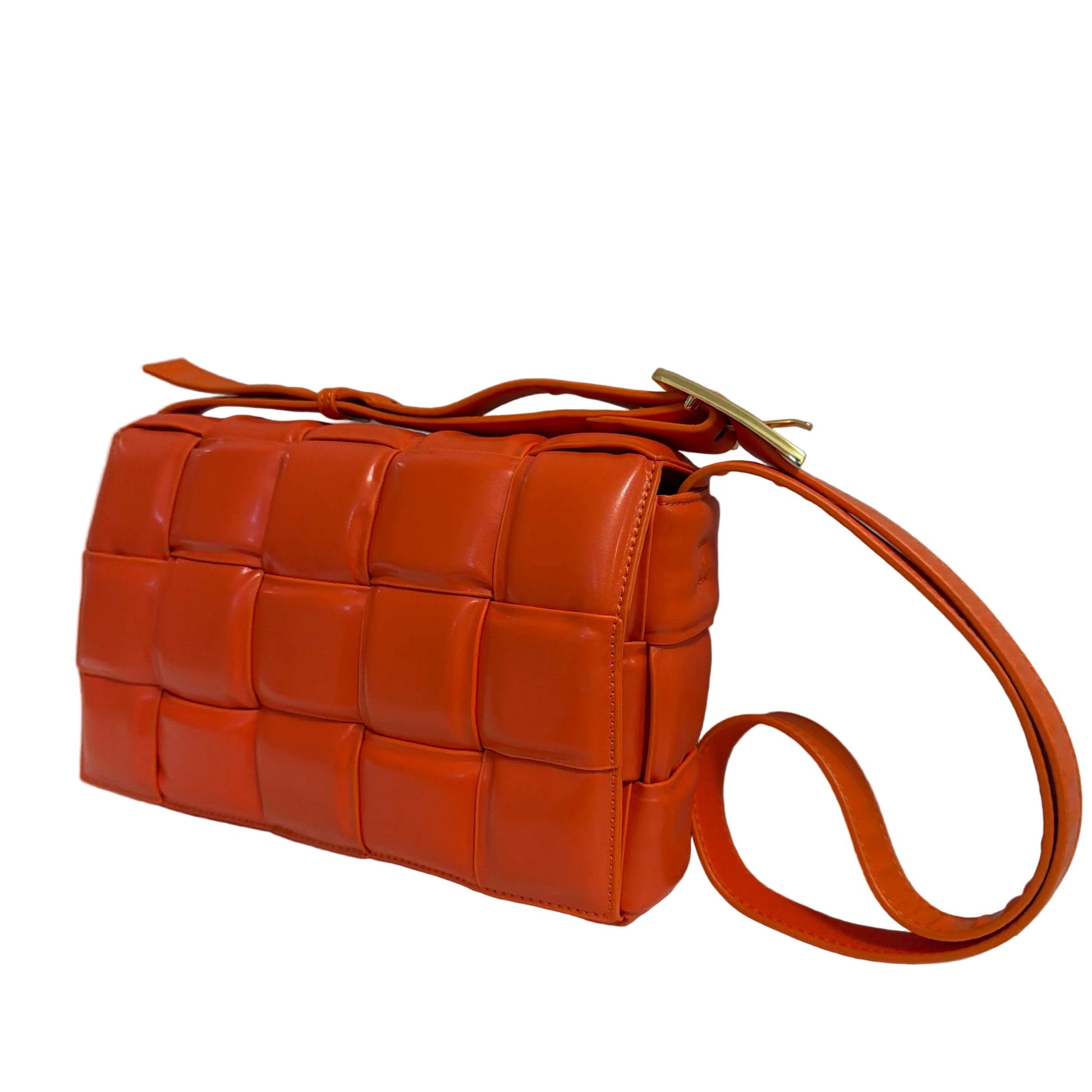 Orange woven handbag on a light gray background
