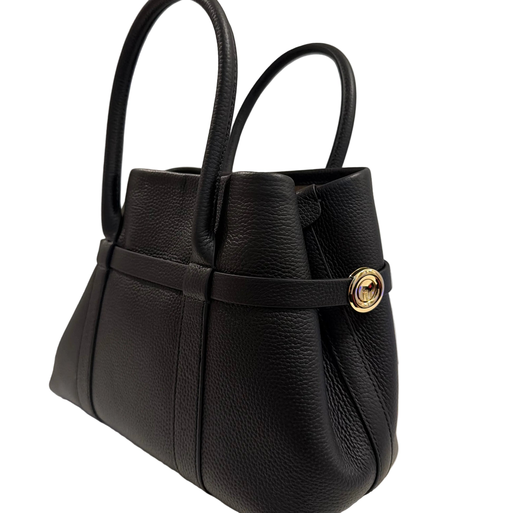 Black leather backpack with a gold button on a light gray background