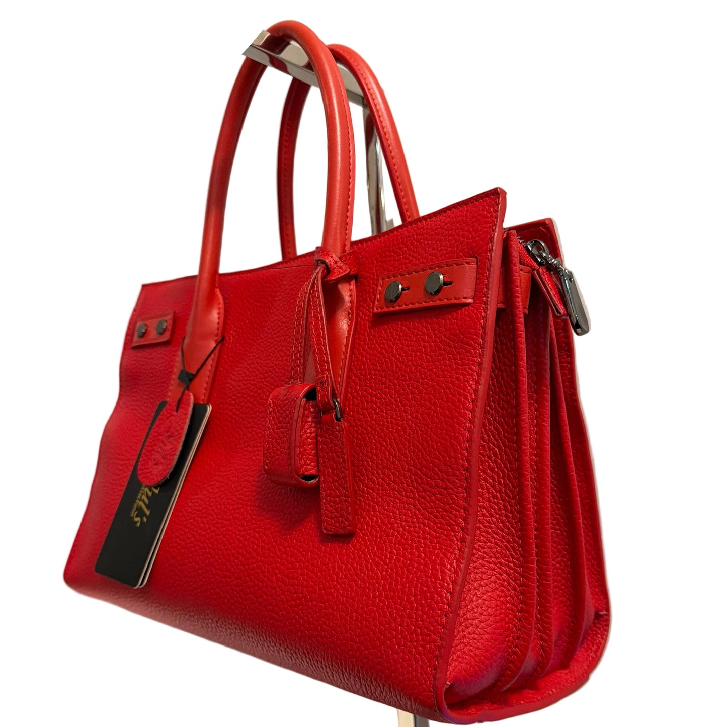 Red handbag with silver accents on a white background