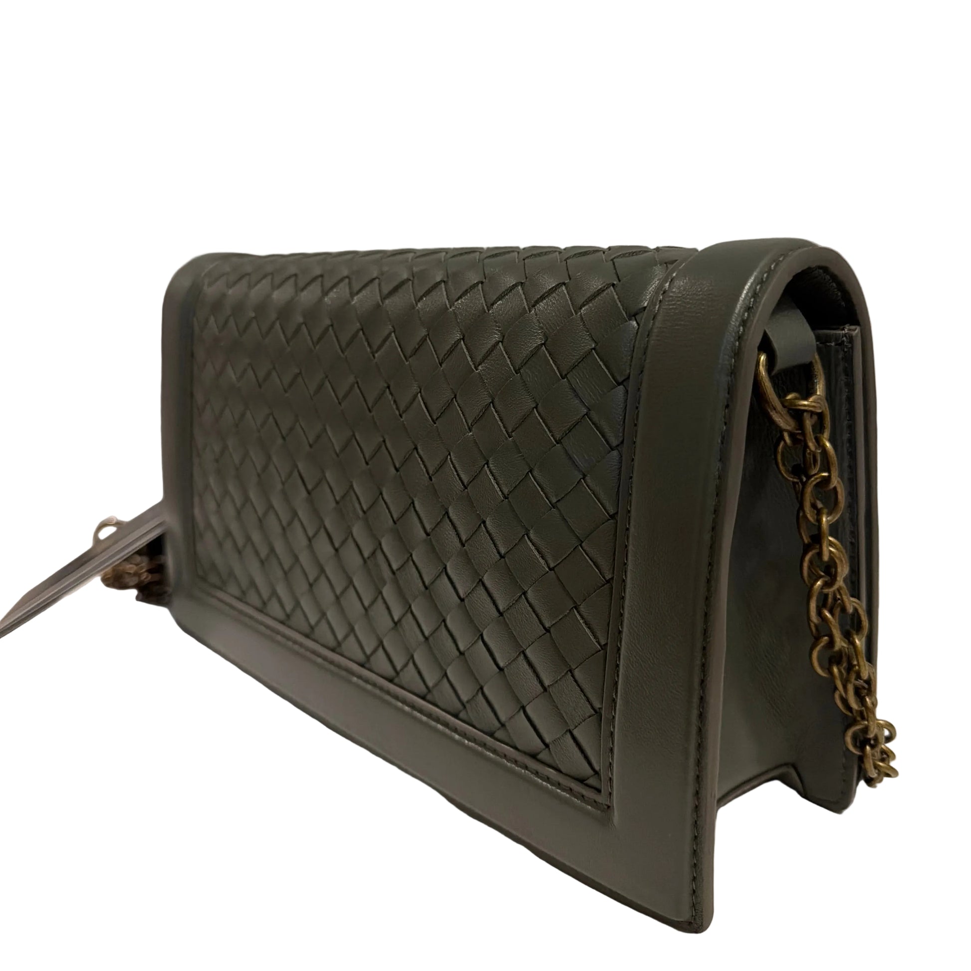 Black woven handbag with chain detail on a light gray background