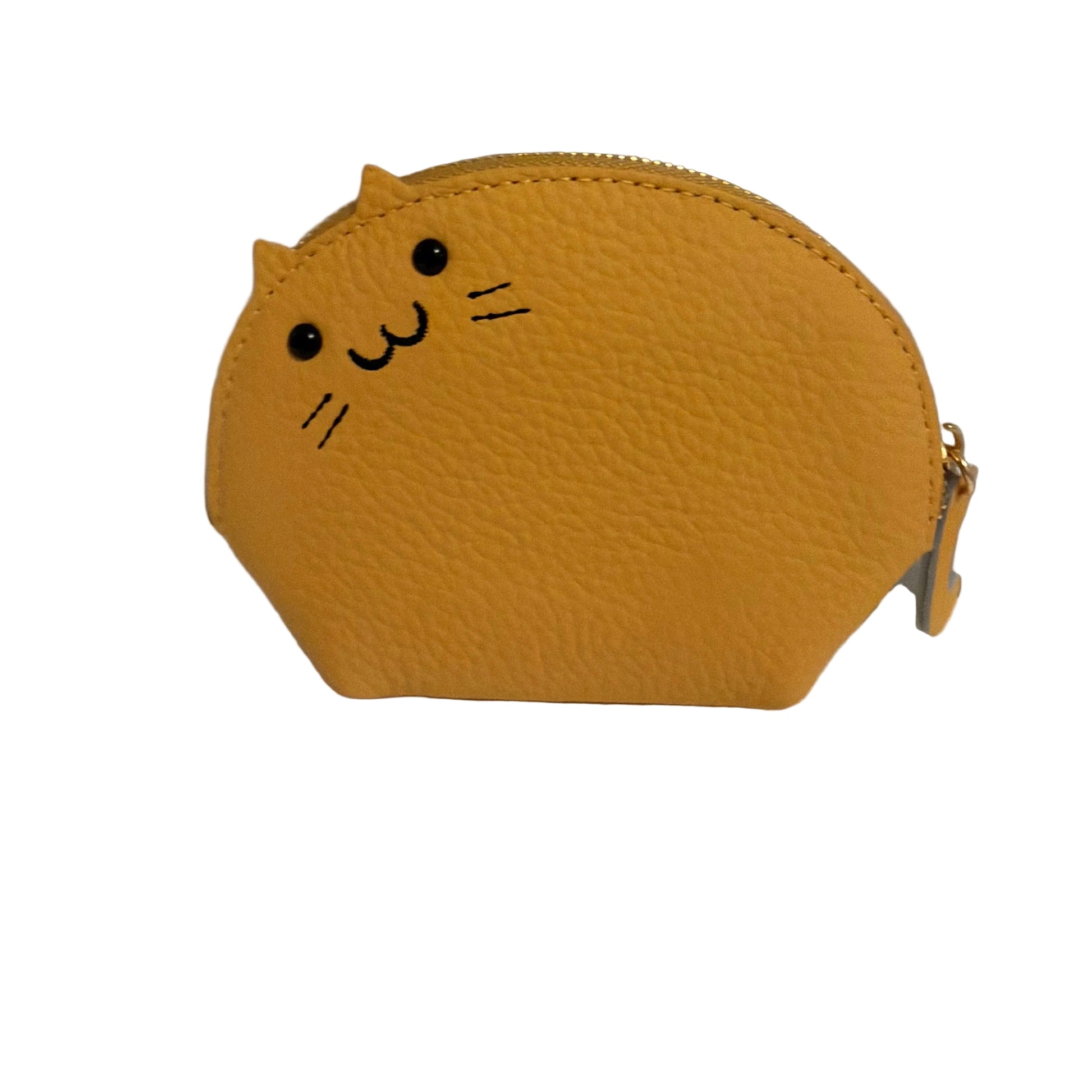 Yellow cat-shaped coin purse on a white surface with a gray background