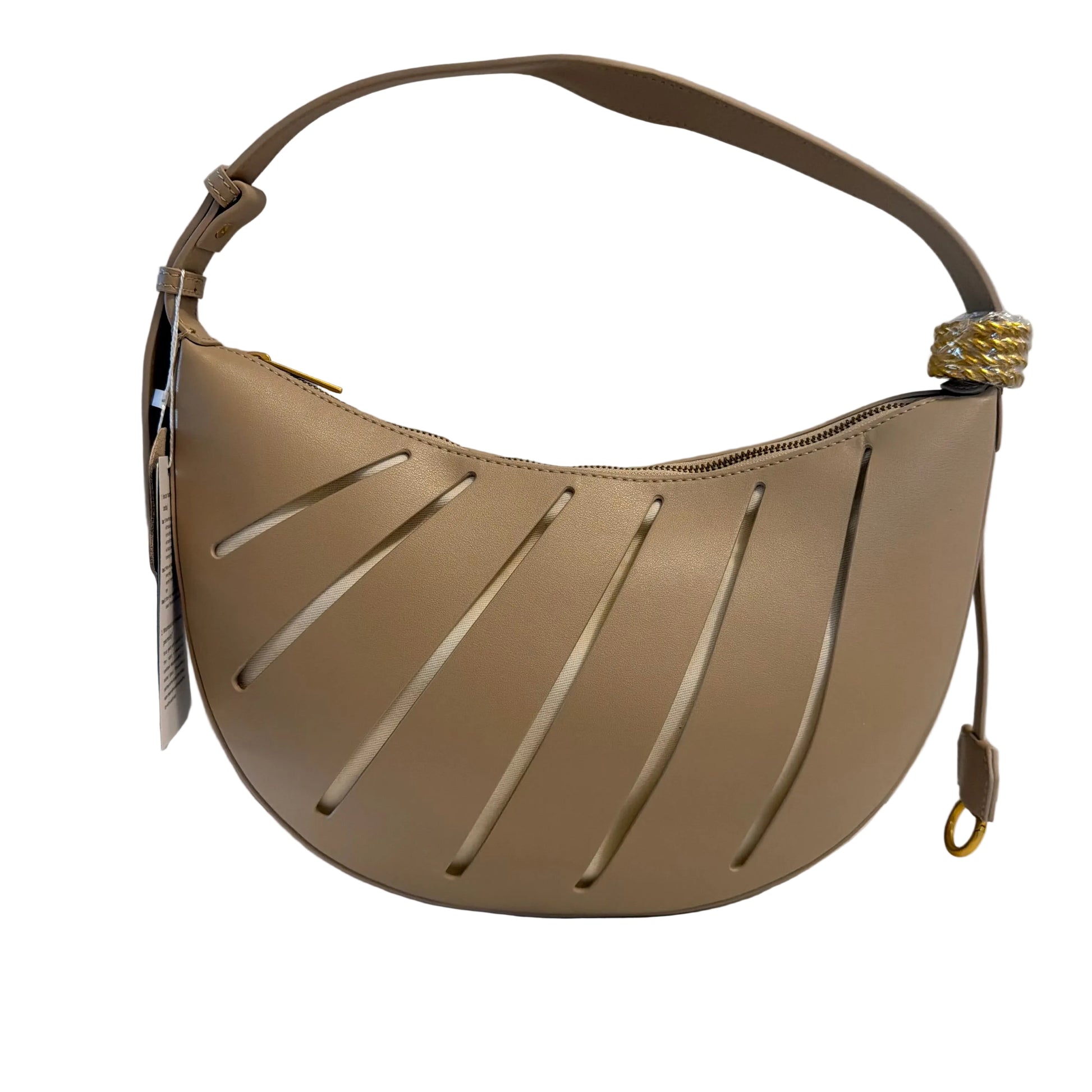 Beige handbag with cut-out design on a light gray background