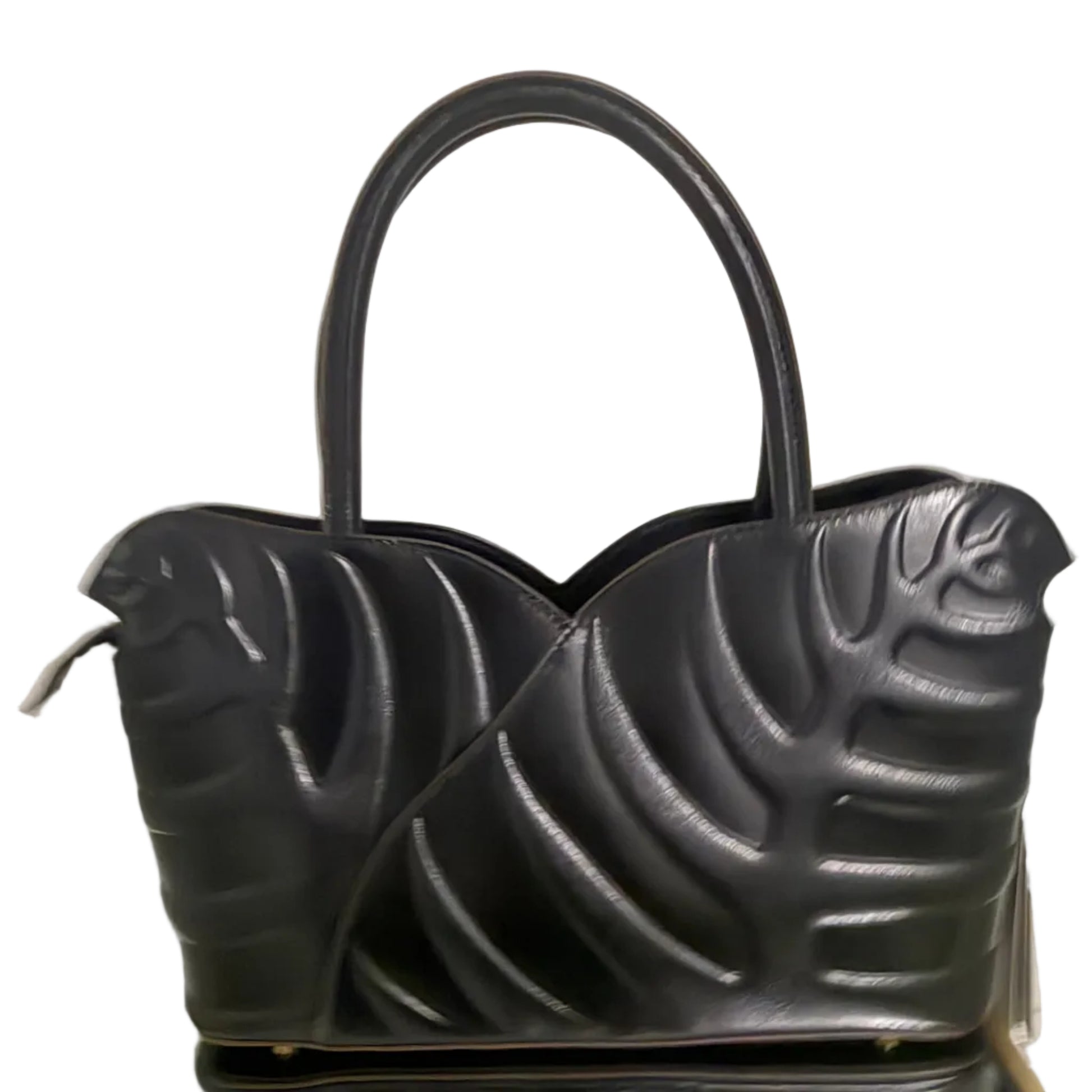 Black handbag with a unique design on a light background