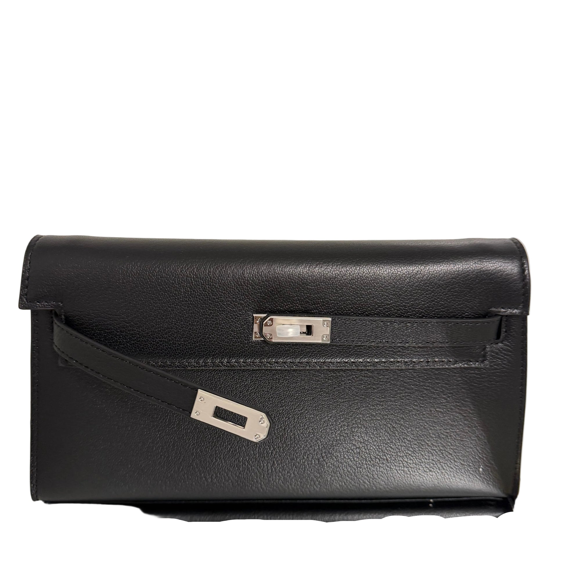 Black leather briefcase with a silver clasp on a light beige background