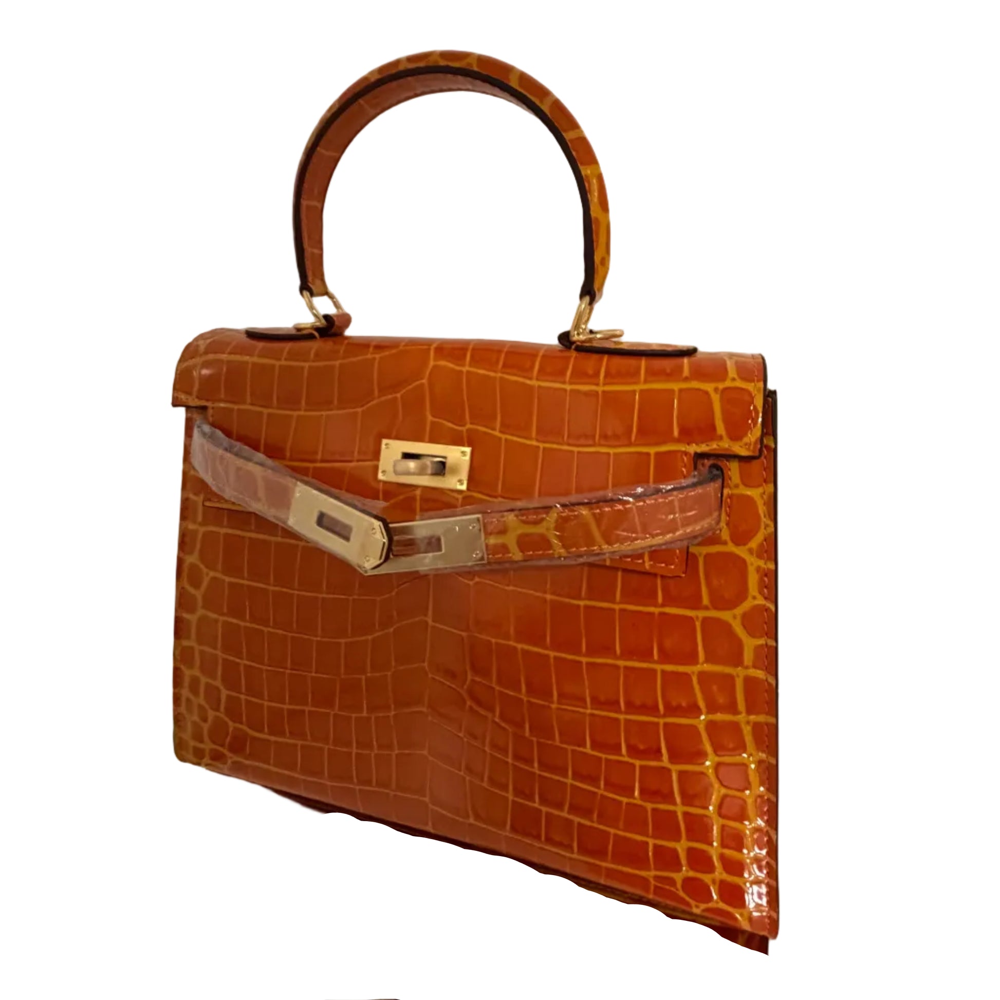 Brown crocodile-patterned handbag on a white background