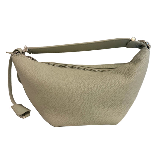 A light sage green pebbled leather shoulder bag with a top zipper and a matching shoulder strap, resting on a white surface against a light gray background.