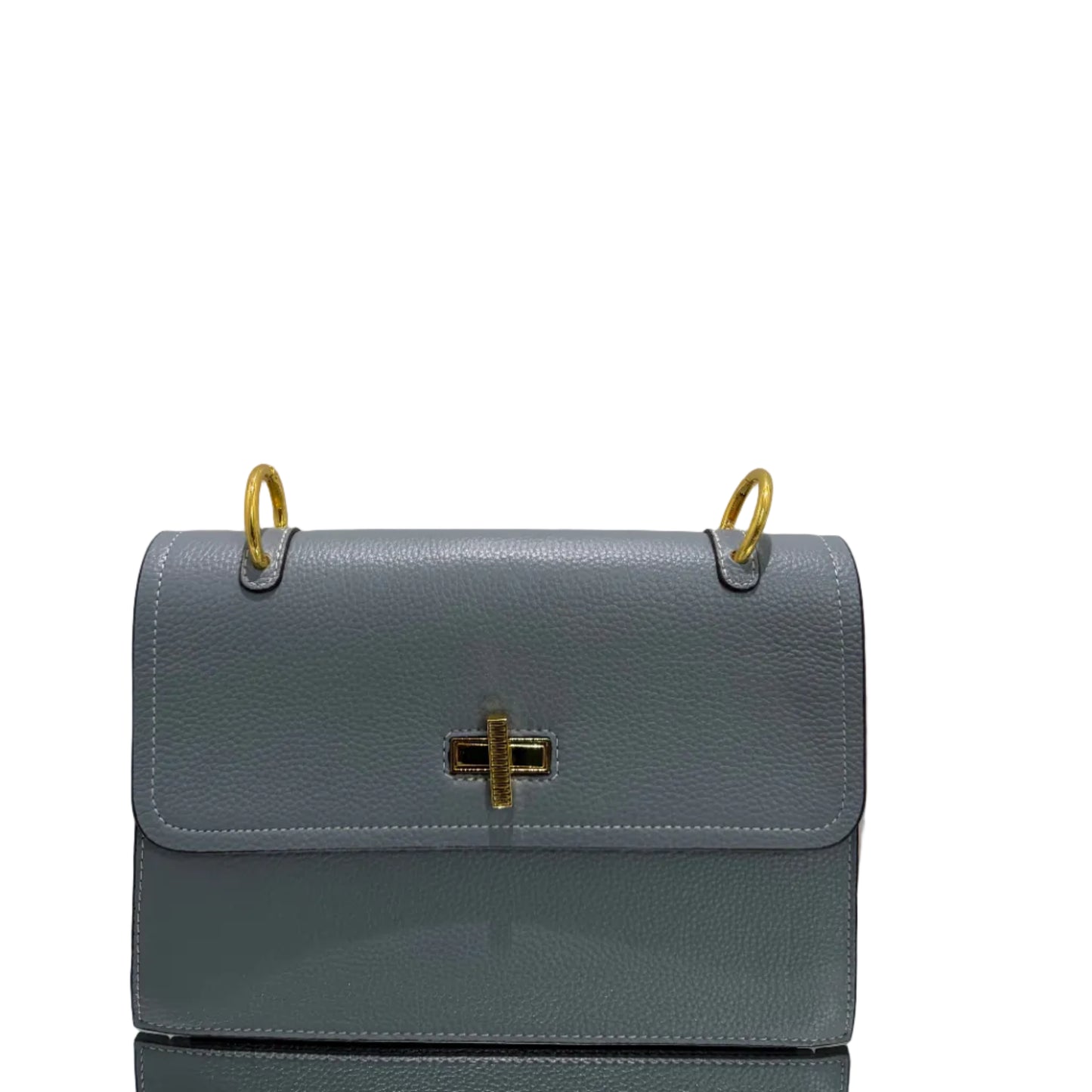 Gray leather planner with gold accents on a light gray background