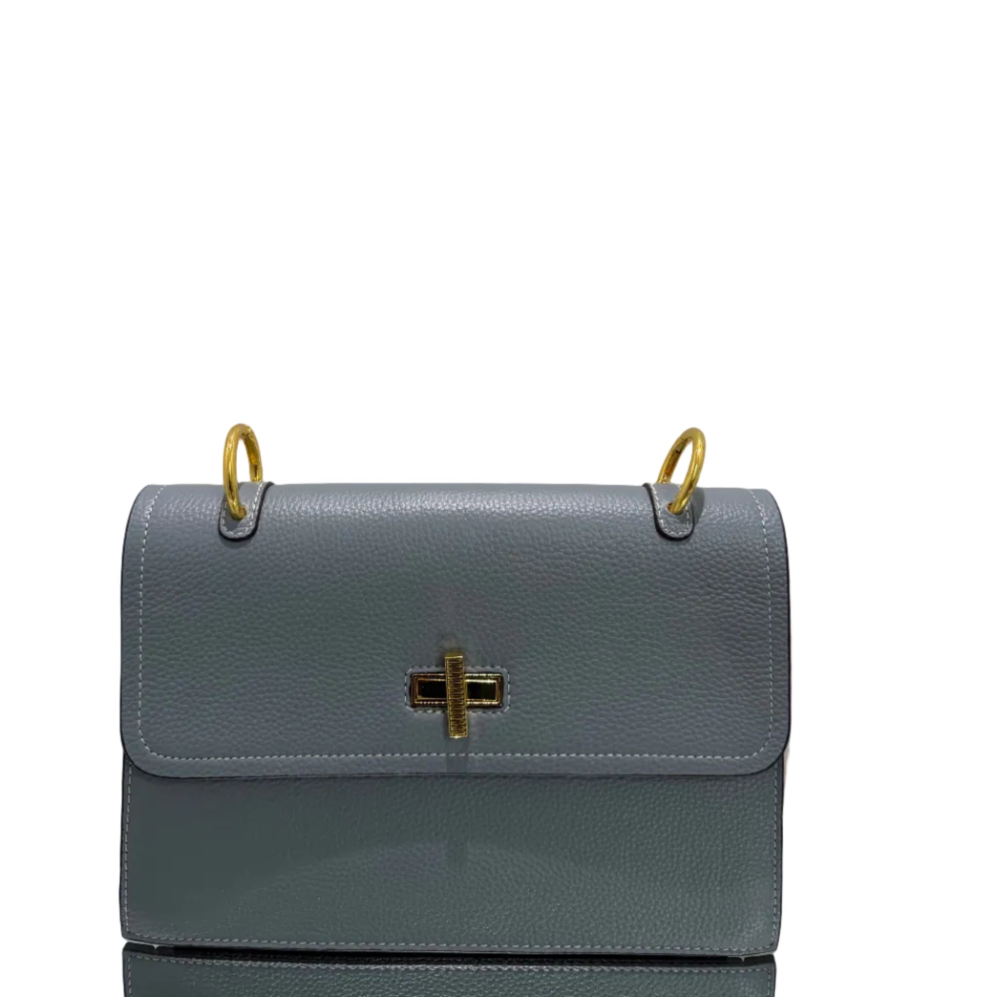 Gray leather planner with gold accents on a light gray background