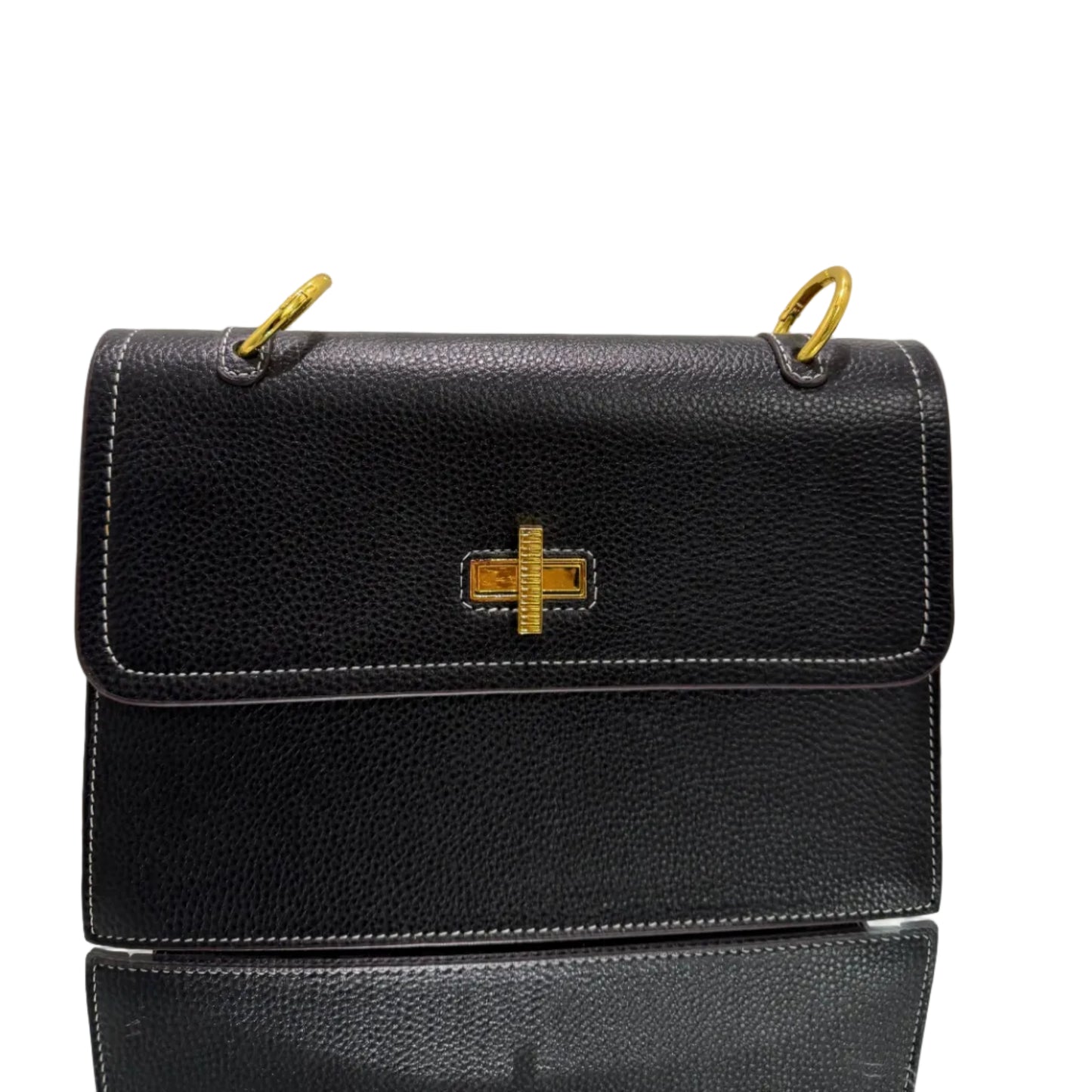 Black leather handbag with gold accents on a light gray background
