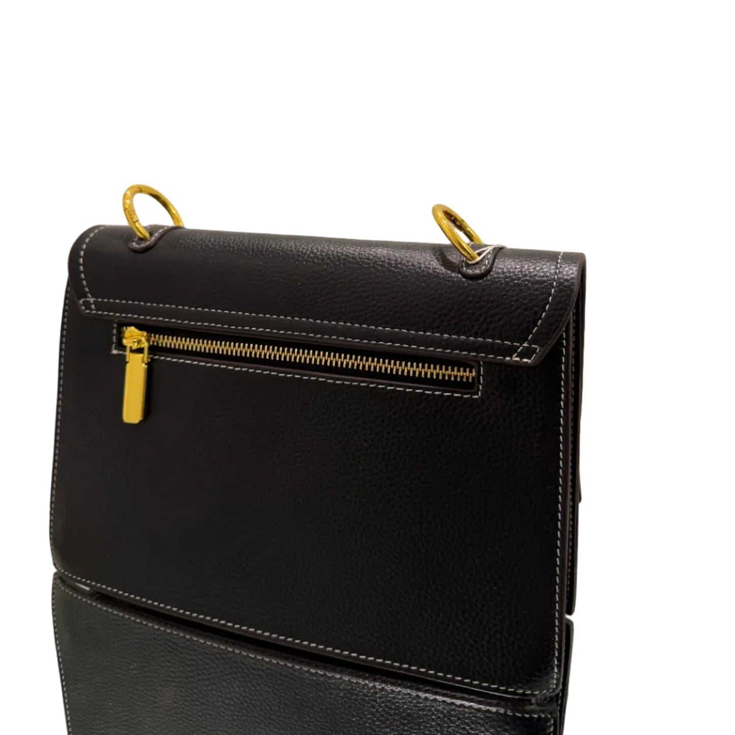 Black leather handbag with gold zipper and hardware on a light gray background