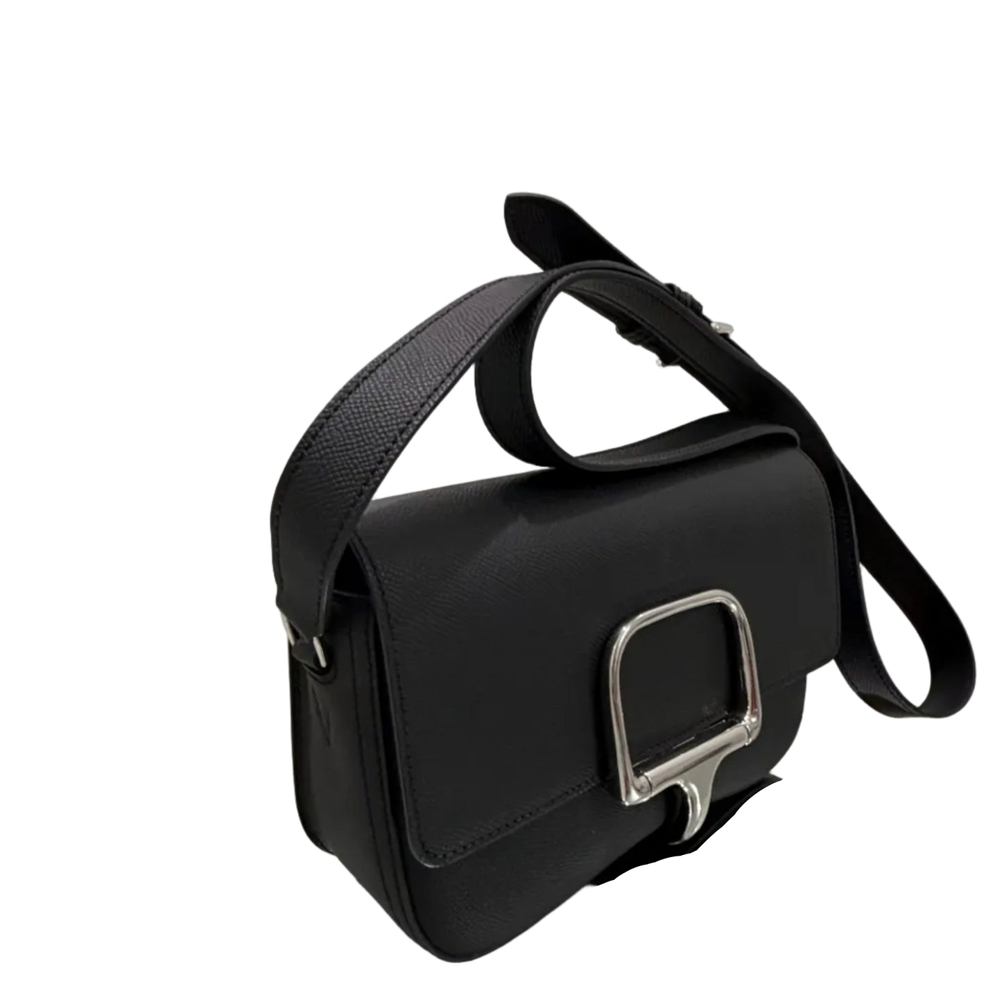 Black handbag with silver clasp on a reflective surface